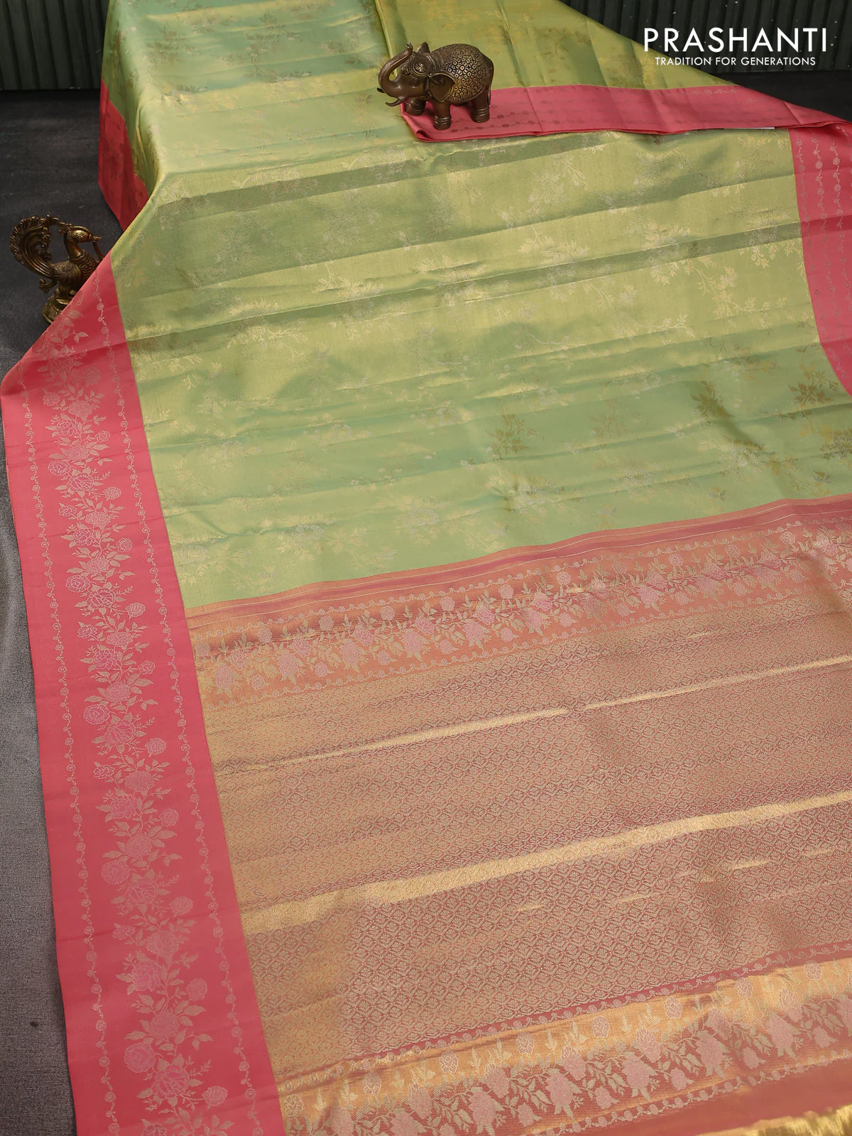 Pure kanchipuram Tissue silk saree pista green and peach shade with allover zari weaves and floral design zari border - Image 5