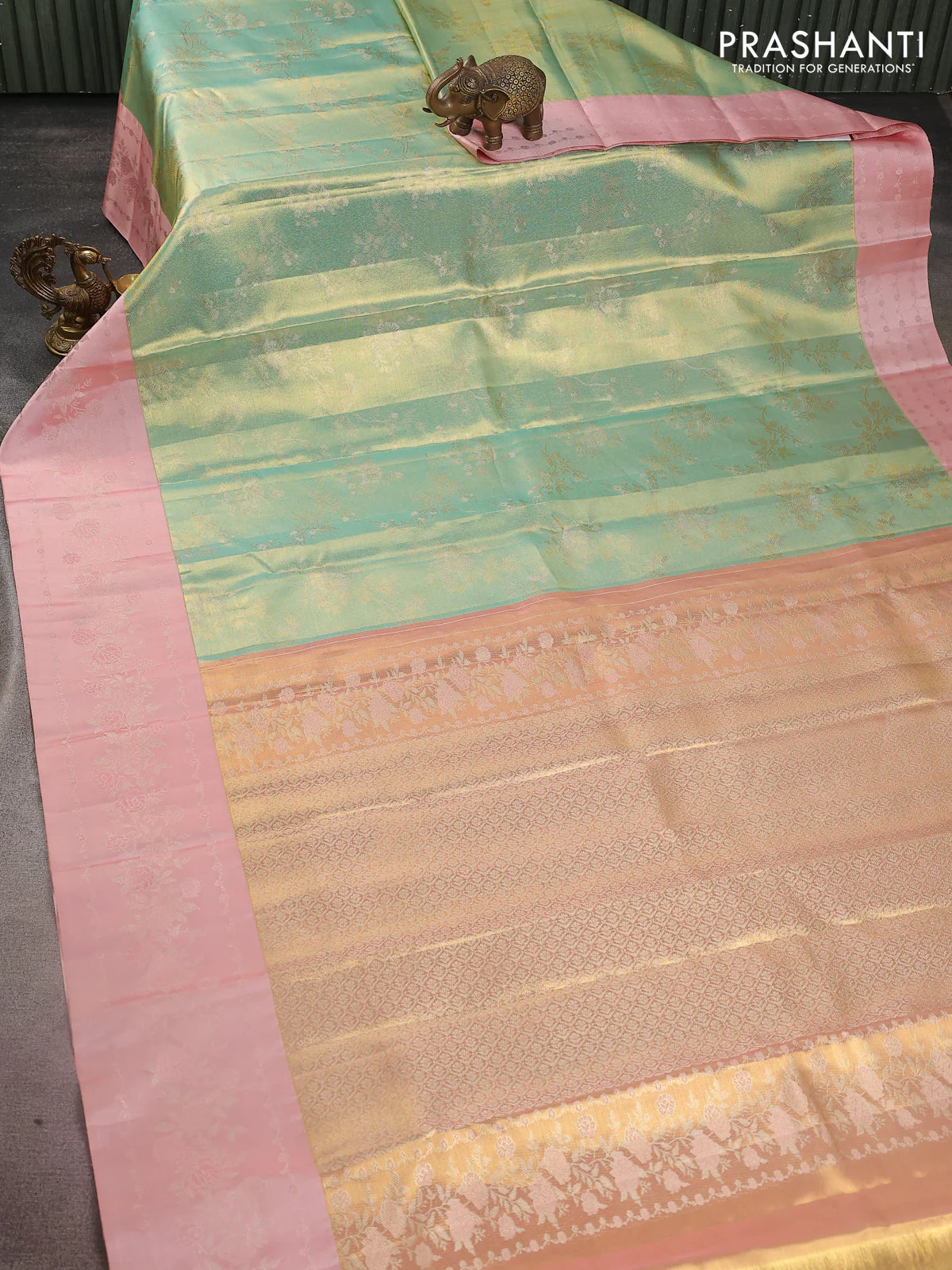 Pure kanchipuram Tissue silk saree teal green and peach shade with allover zari weaves and floral design zari border - Image 2