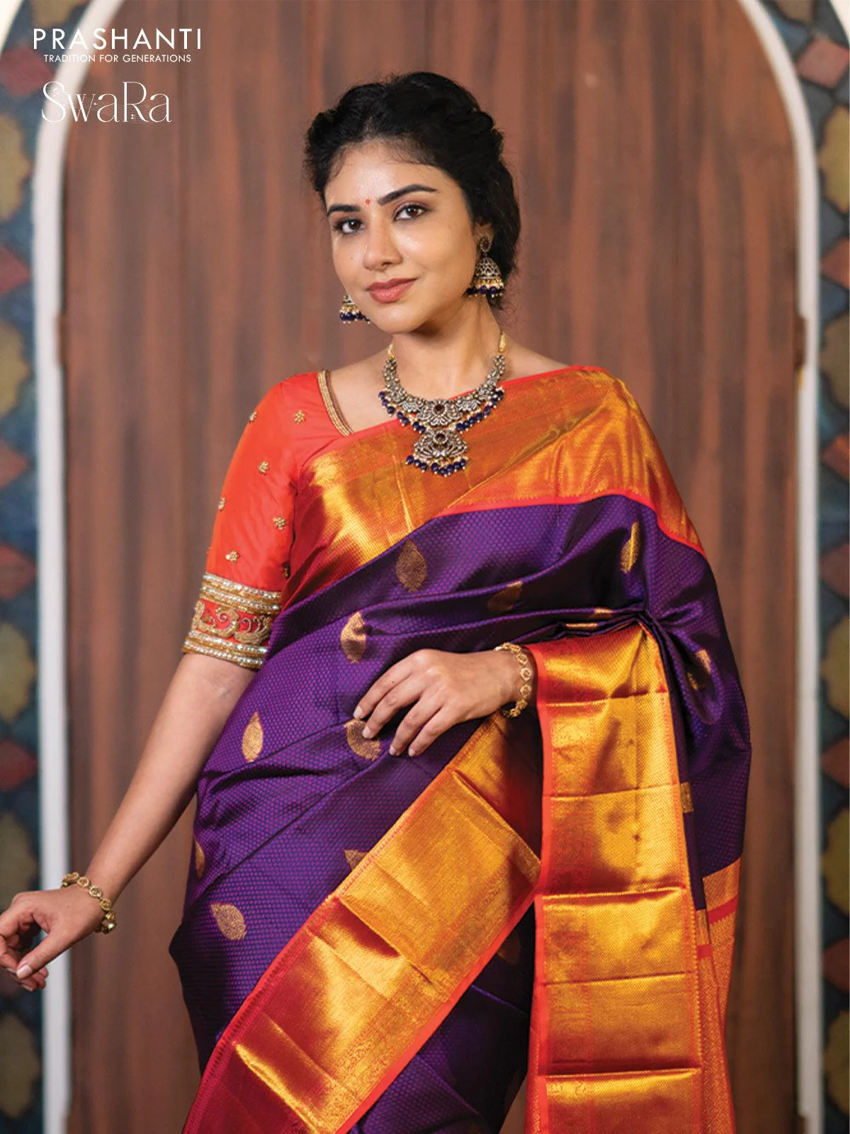 Pure kanjivaram silk saree dark blue and dual shade of pinkish orange with allover self emboss & zari buttas and rich zari woven border - Image 3