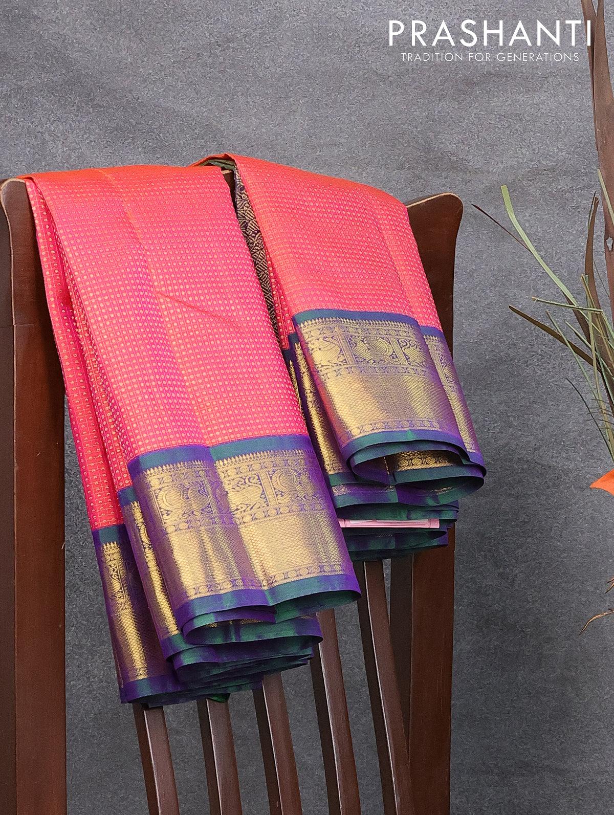 Pure kanjivaram silk saree dual shade of pinkish orange and dual shade of bluish green with allover zari weaves and zari woven border - Image 8