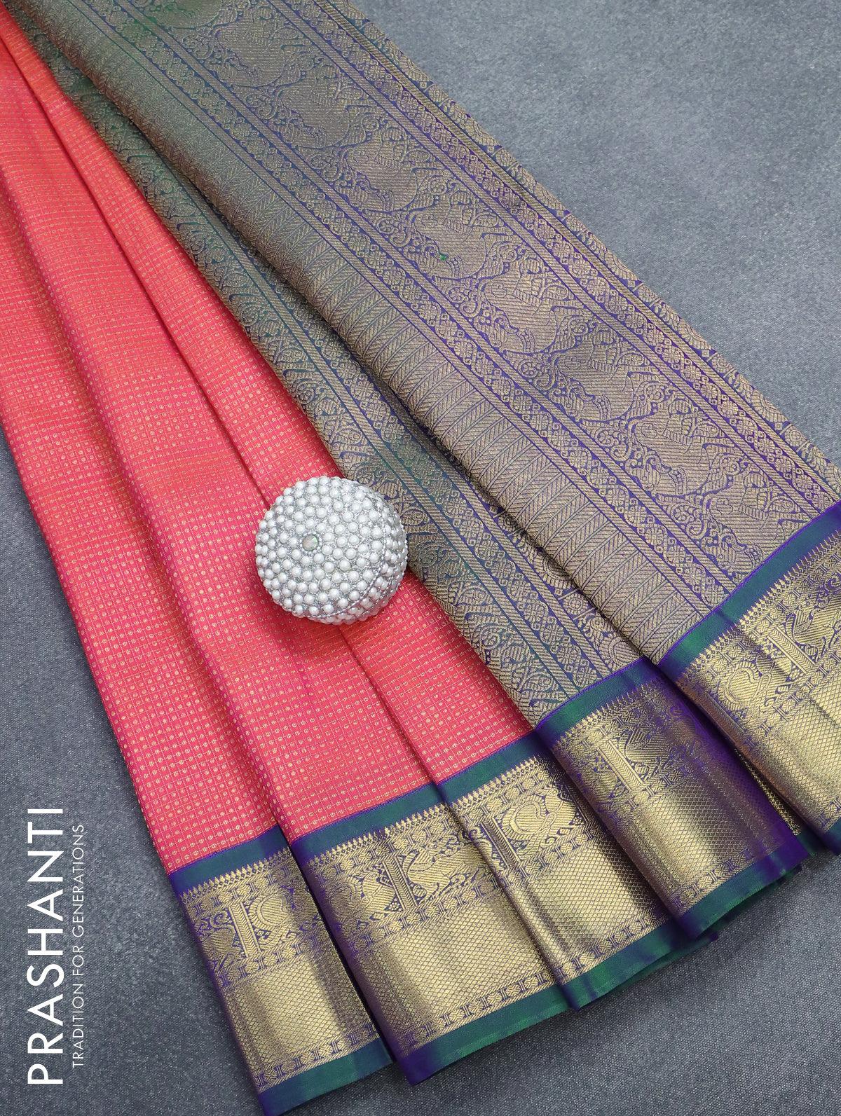 Pure kanjivaram silk saree dual shade of pinkish orange and dual shade of bluish green with allover zari weaves and zari woven border - Image 9