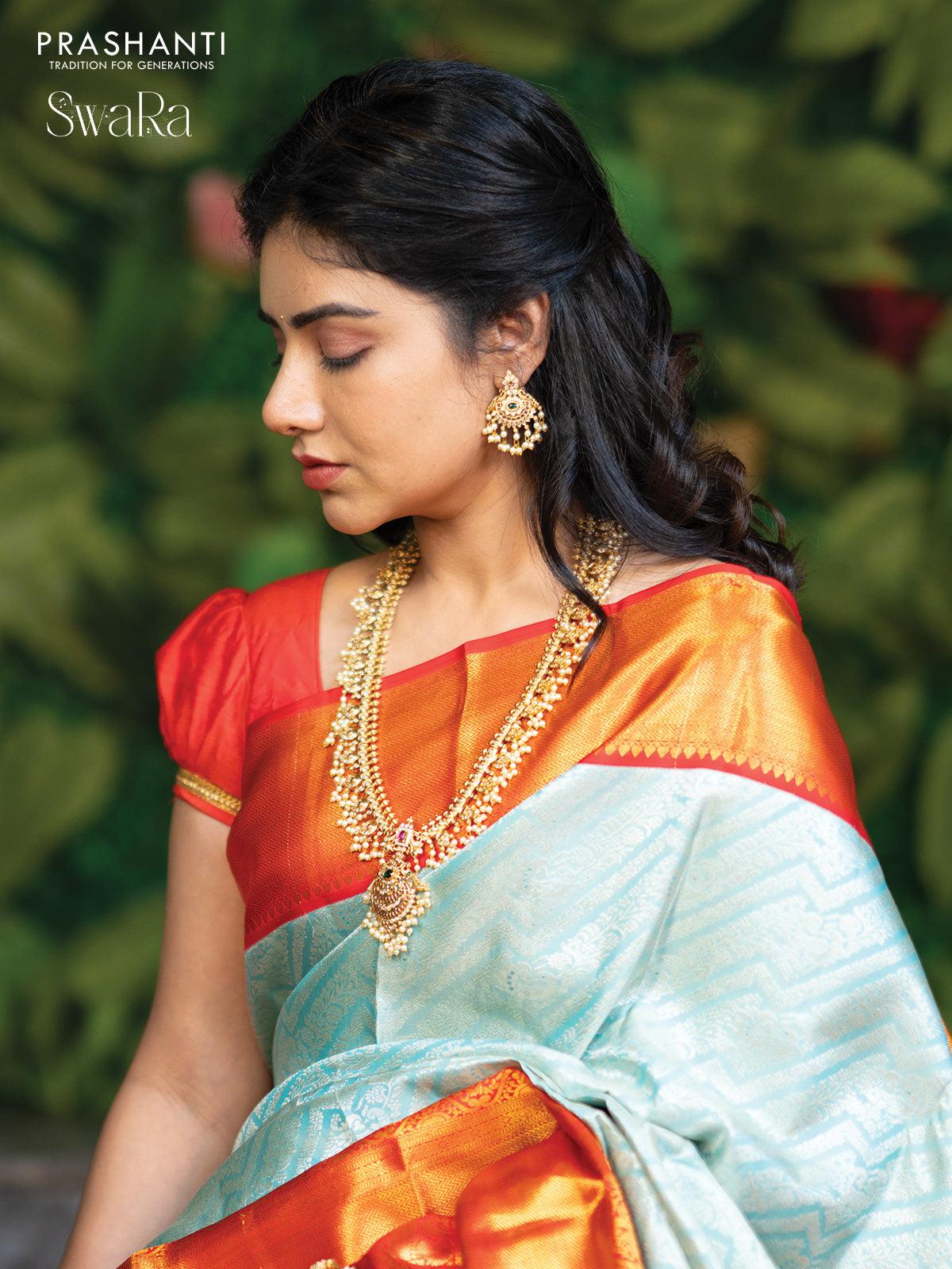Pure kanjivaram silk saree light blue and red with allover silver zari woven brocade weaves and golden zari woven border - Image 3