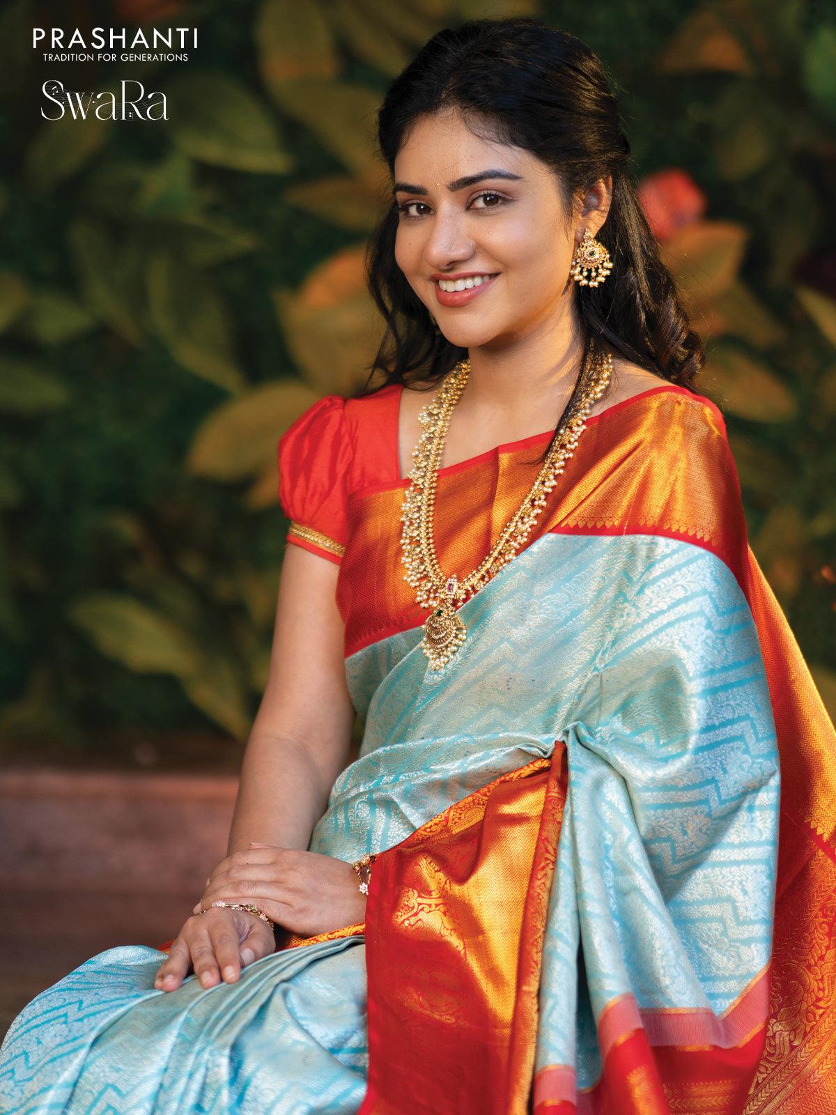 Pure kanjivaram silk saree light blue and red with allover silver zari woven brocade weaves and golden zari woven border - Image 4