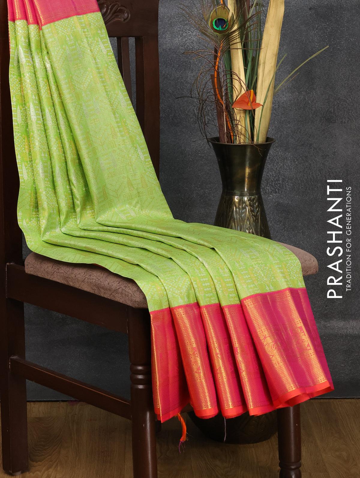 Pure kanjivaram silk saree light green and dual shade of orange with allover zari woven brocade weaves and rich zari woven border - Image 2