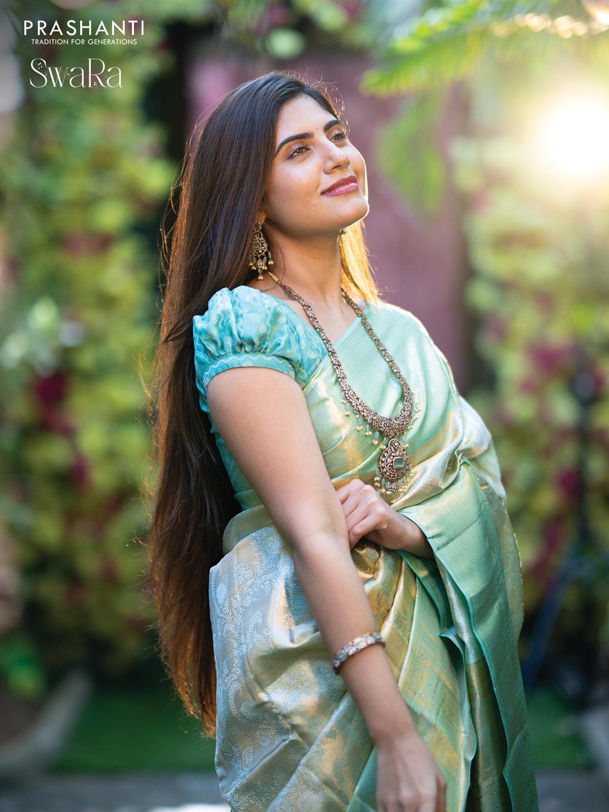 Pure kanjivaram tissue silk saree cream and teal blue with allover zari woven brocade weaves and zari woven border - Image 3