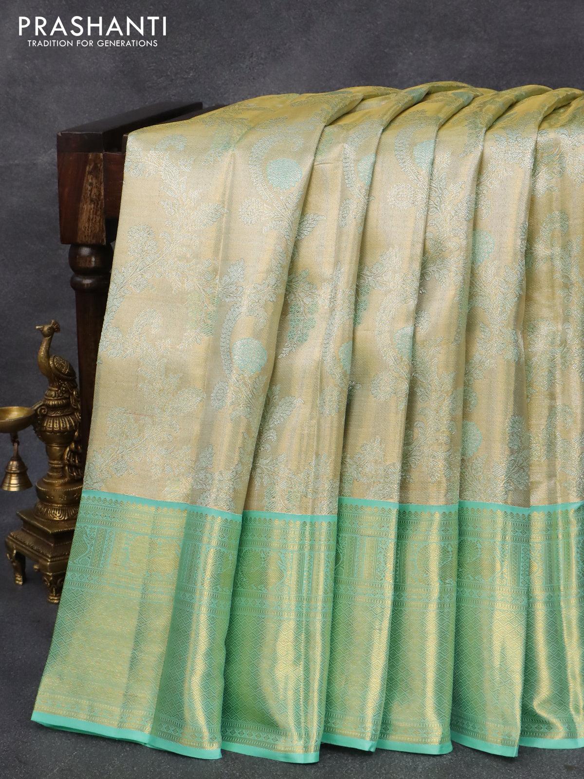 Pure kanjivaram tissue silk saree cream and teal blue with allover zari woven brocade weaves and zari woven border - Image 5