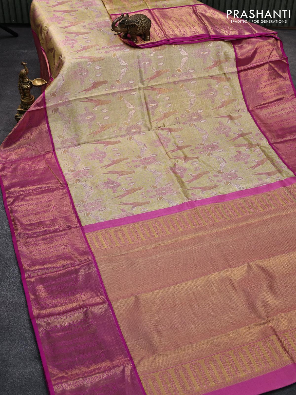 Pure kanjivaram tissue silk saree elaichi green and pink with allover zari woven parrot designbrocade weaves and long zari woven korvai border - Image 2