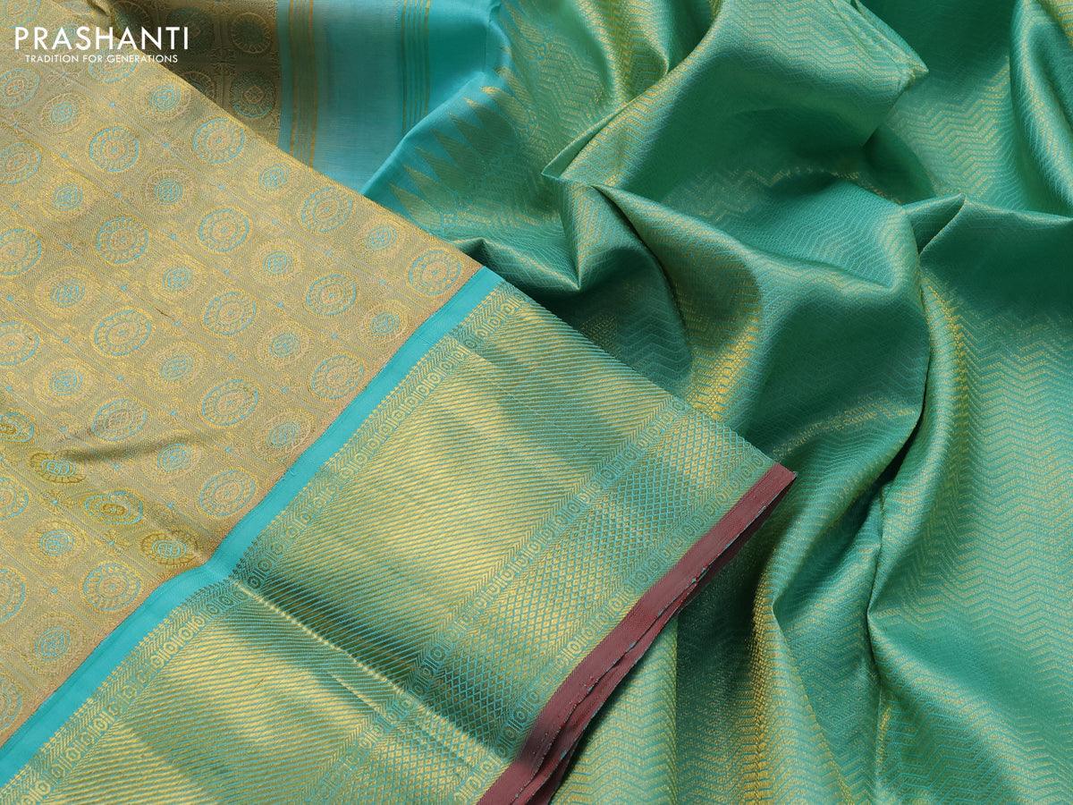 Pure kanjivaram tissue silk saree gold and teal blue with allover rudhraksha zari woven brocade weaves and rich zari woven border - Image 3