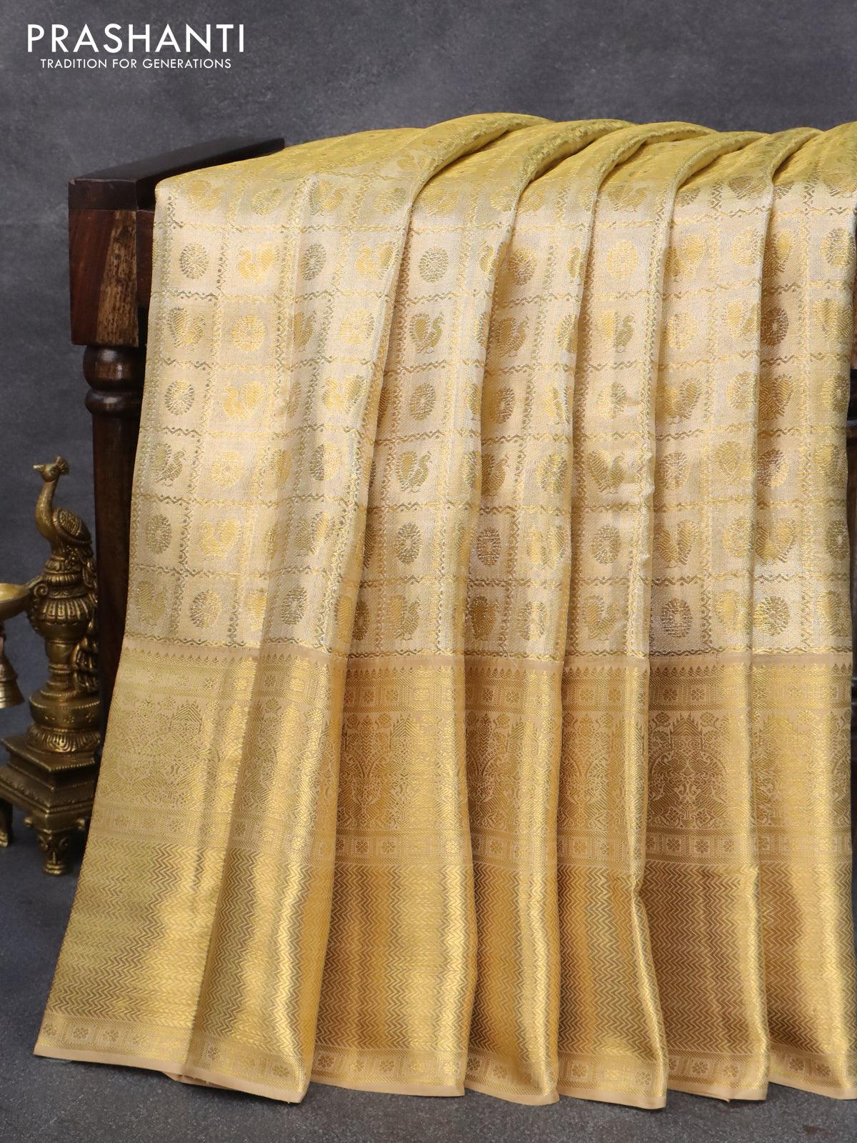 Pure kanjivaram tissue silk saree gold with allover zari woven brocade weaves and long zari woven border - Image 5