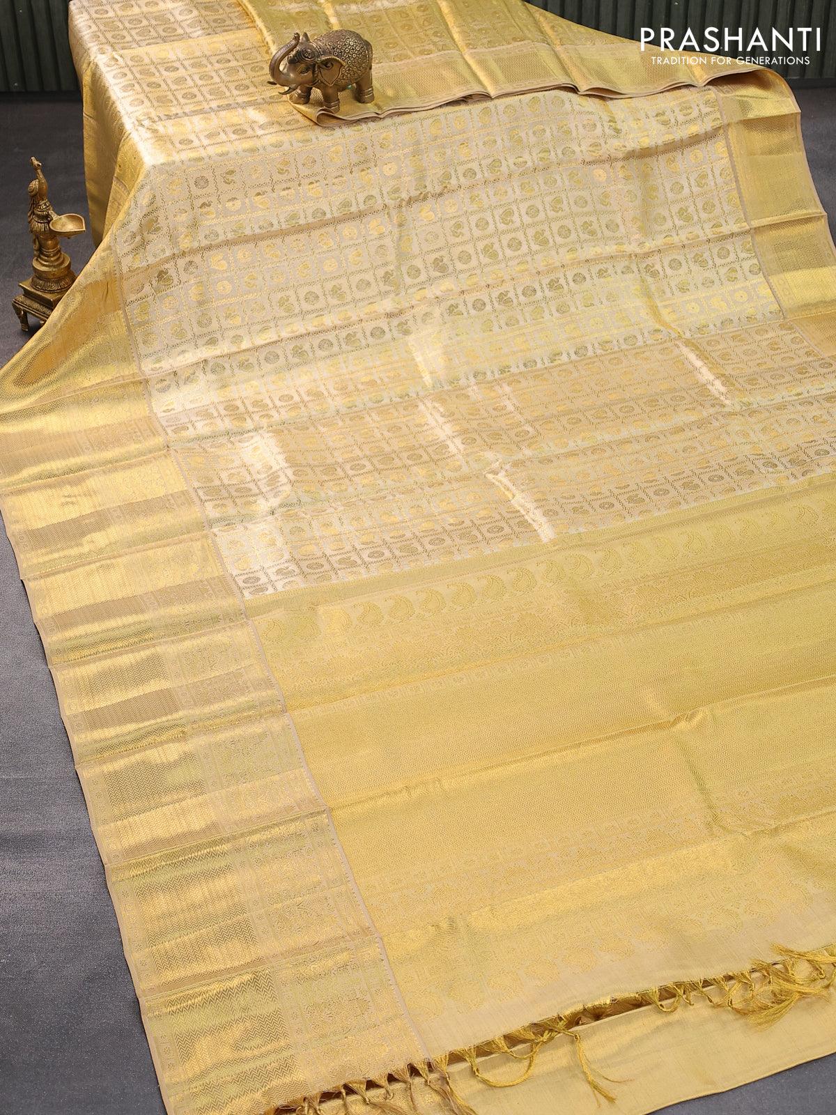 Pure kanjivaram tissue silk saree gold with allover zari woven brocade weaves and long zari woven border - Image 6