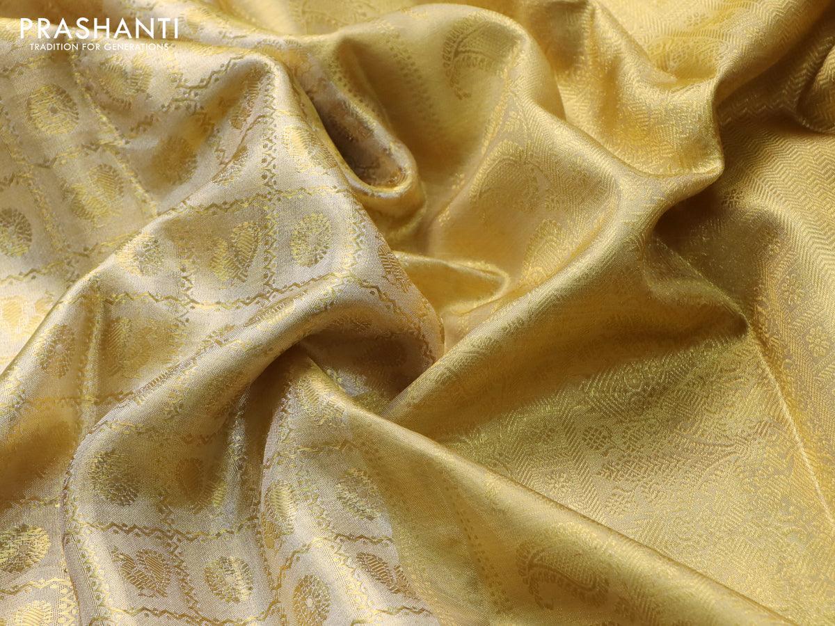 Pure kanjivaram tissue silk saree gold with allover zari woven brocade weaves and long zari woven border - Image 7