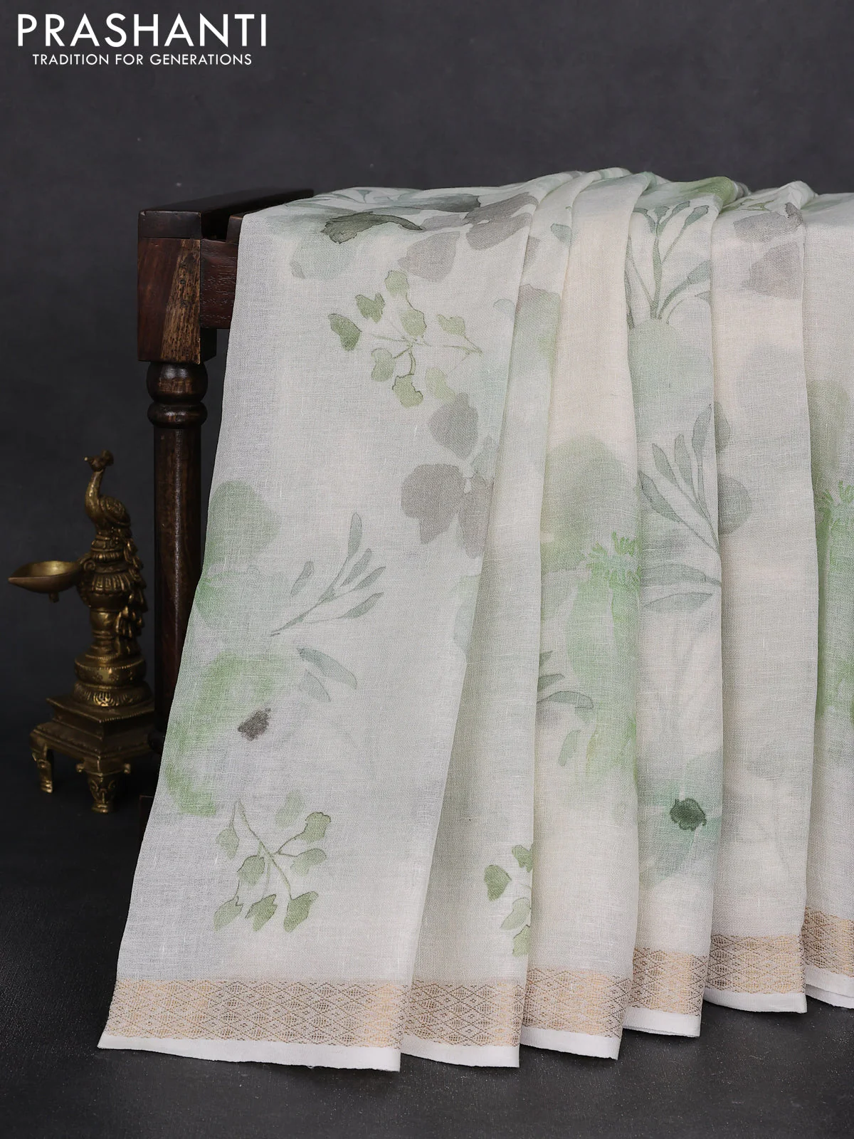 Pure linen saree cream and light green with allover flower prints and zari woven border - Image 2