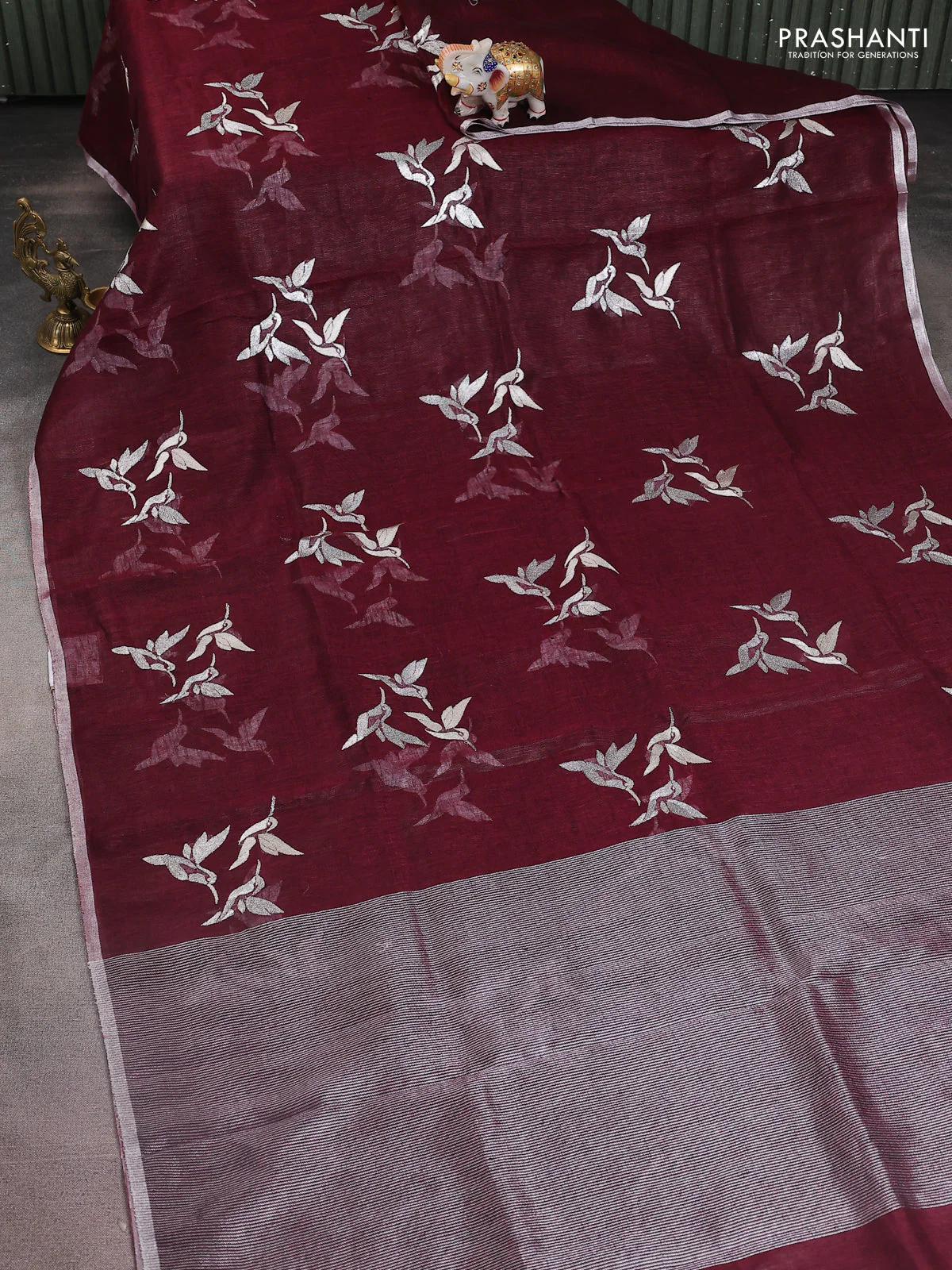 Pure linen saree maroon with thread & silver zari woven buttas and silver zari woven piping border