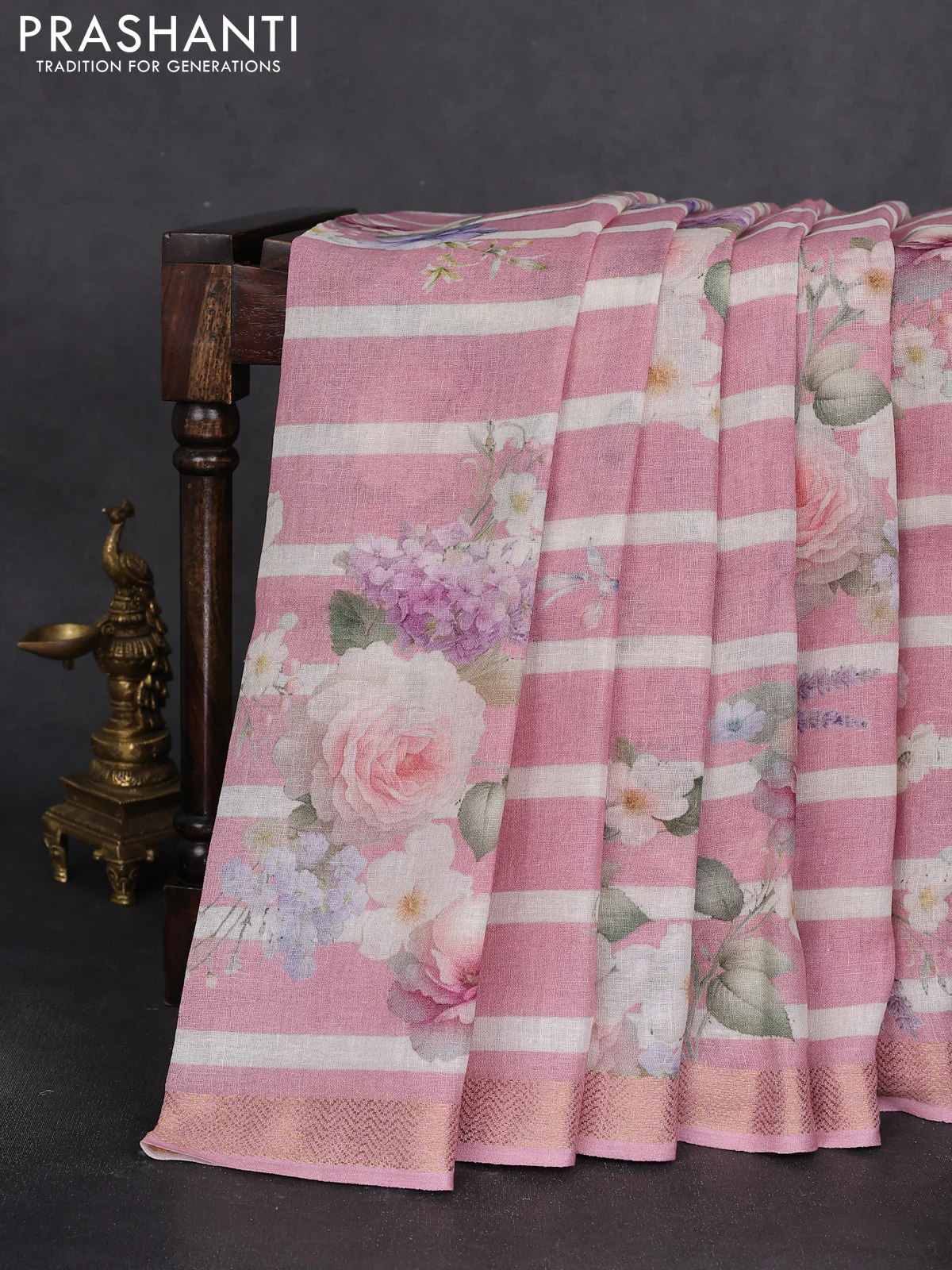 Pure linen saree peach pink and off white with allover flower prints and zari woven border - Image 2