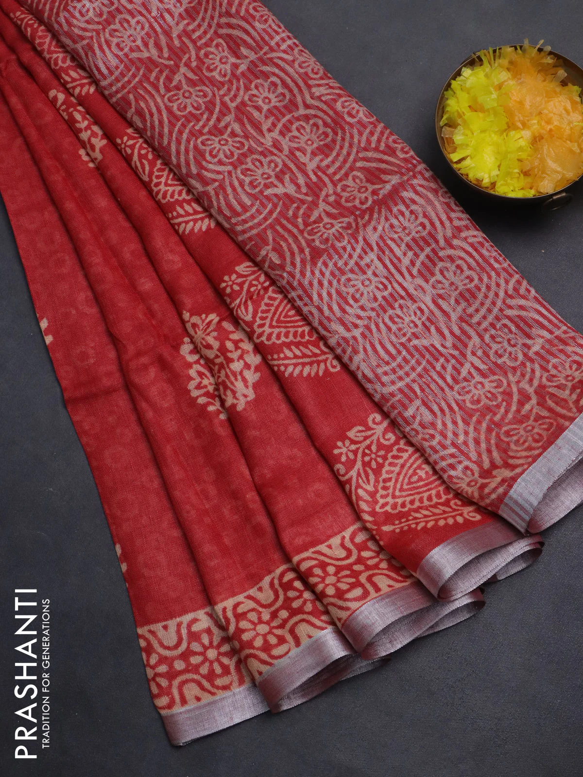 Pure linen saree red with allover butta prints and silver zari woven border