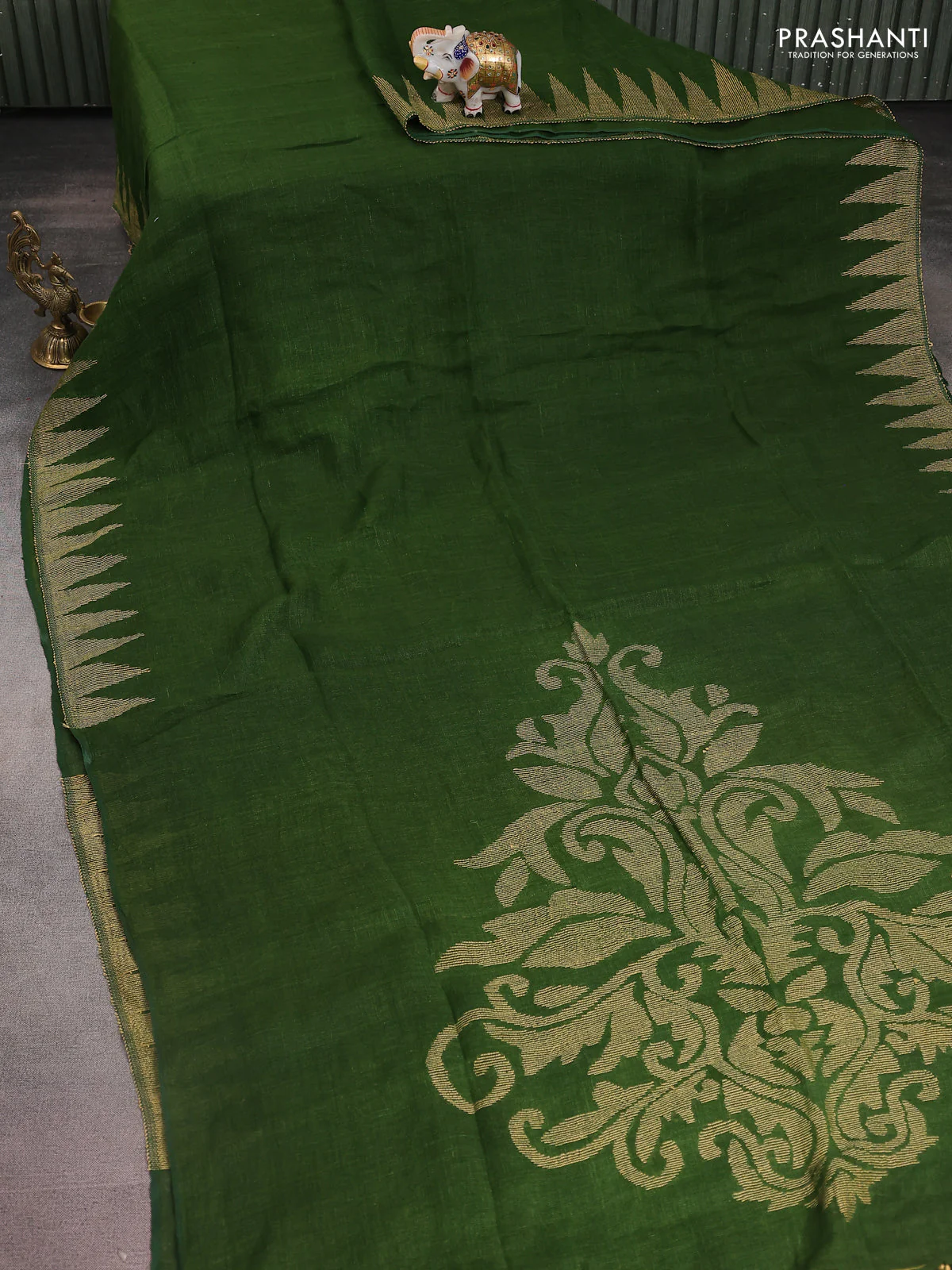 Pure linen saree sap green with plain body and thread weaving pallu