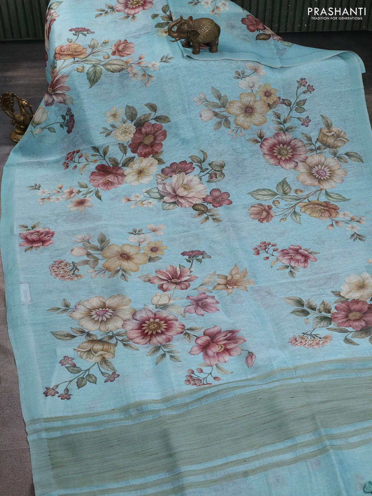 Pure linen silk saree light blue with allover floral prints and simple border - Image 2