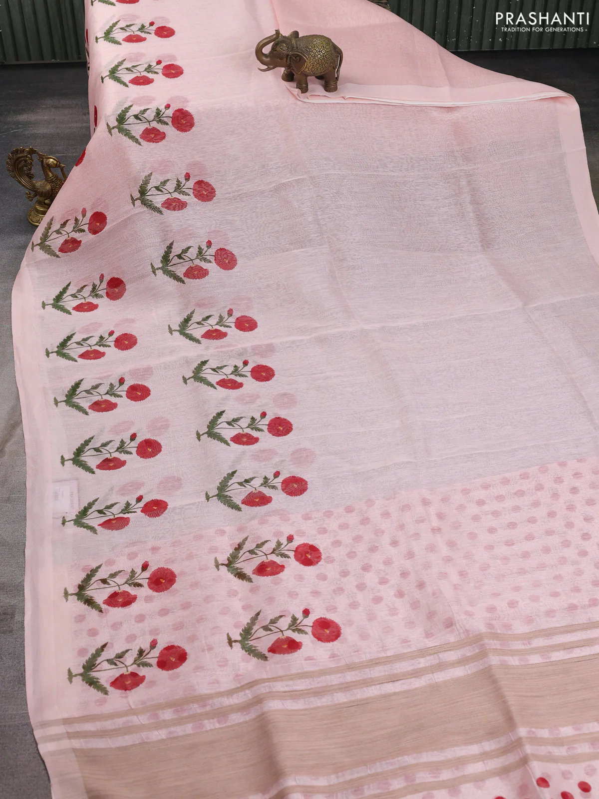 Pure linen silk saree mild peach with allover floral prints and simple border - Image 2