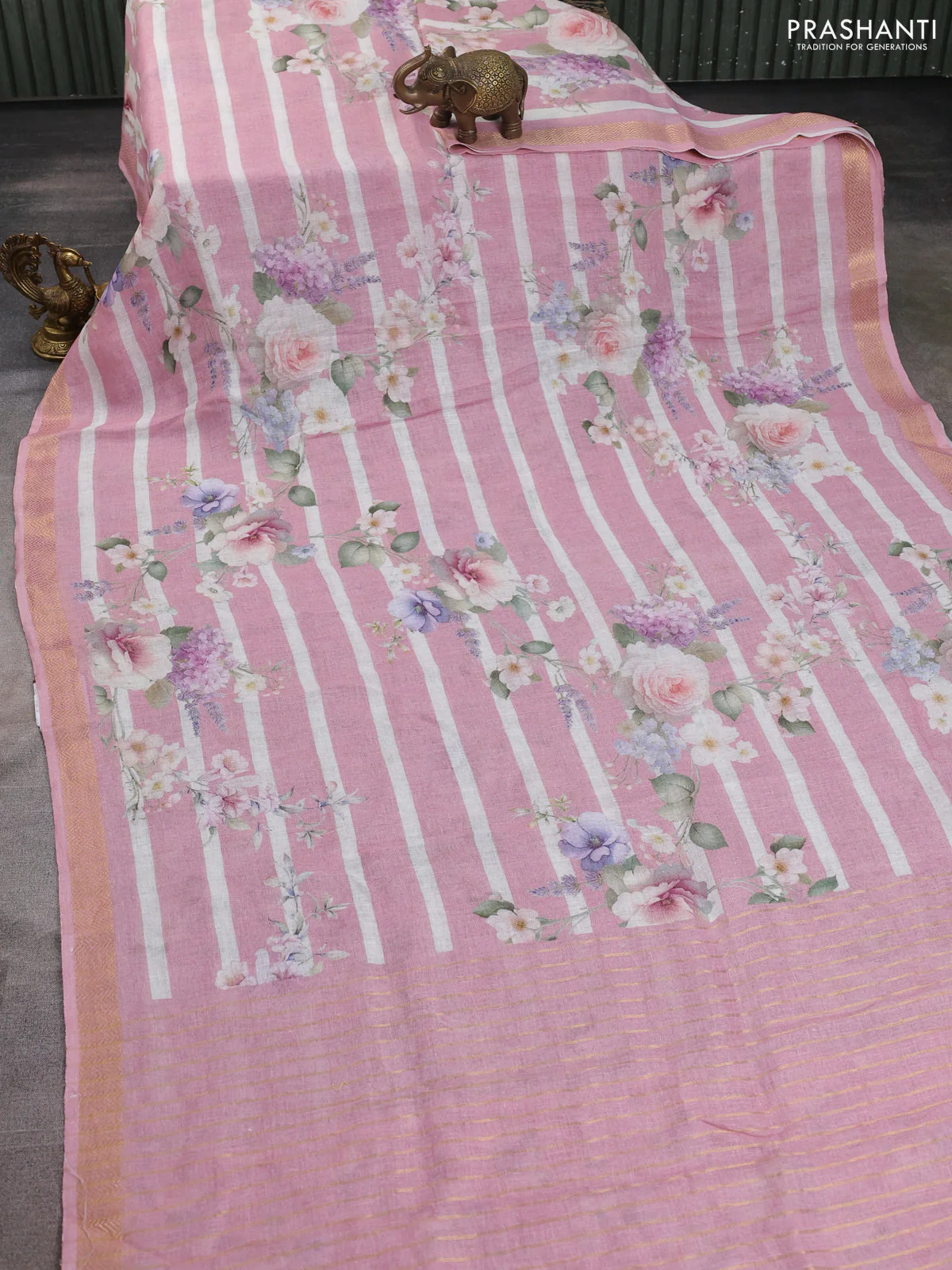 Pure linen silk saree mild peach with allover floral prints and zari woven border - Image 2