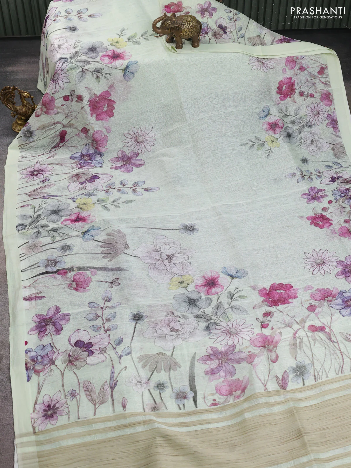 Pure linen silk saree mild pista green and grey with allover floral prints and simple border - Image 2