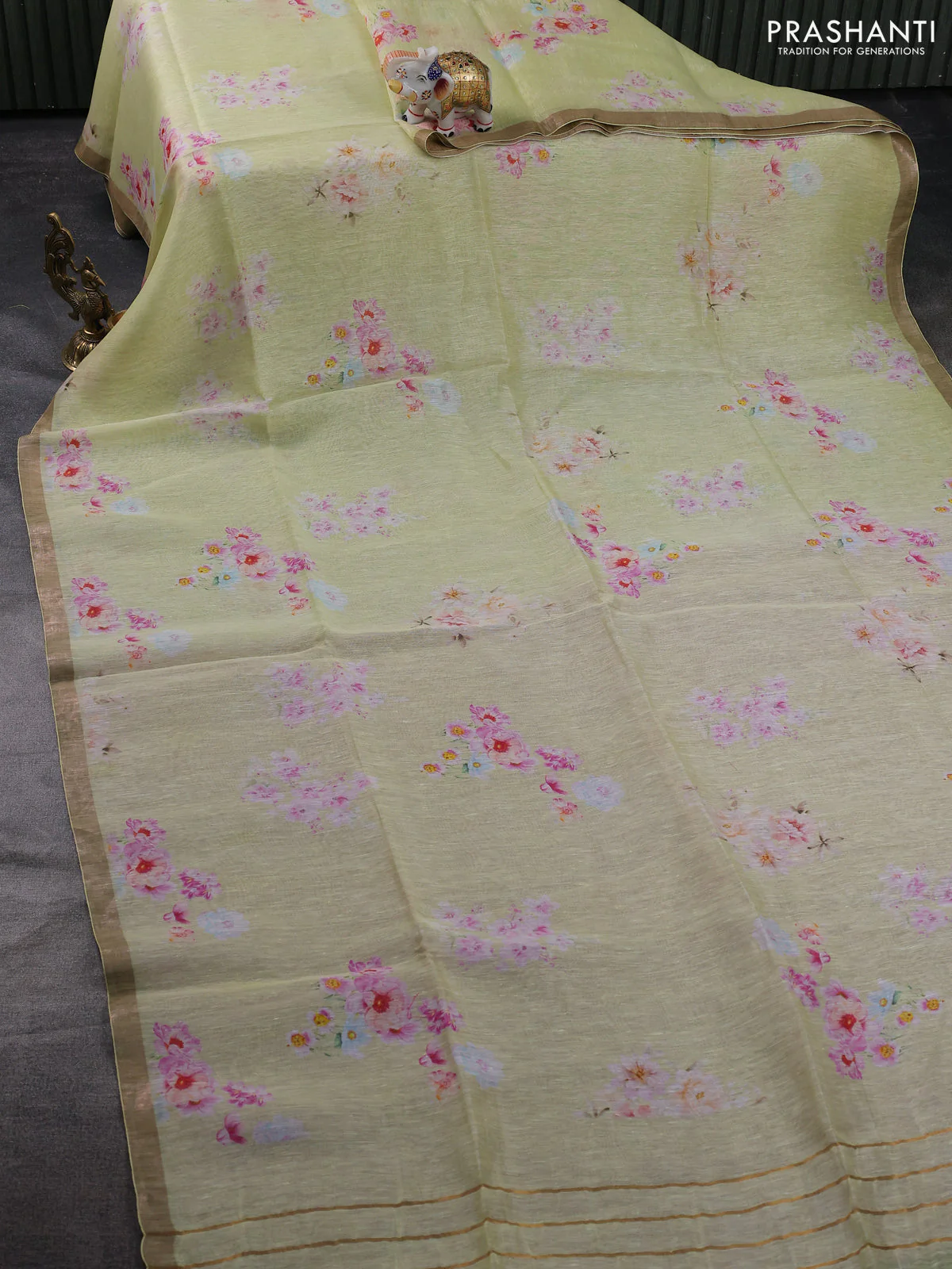 Pure linen silk saree mild pista green and pink shade with floral butta prints and small zari woven border - Image 2