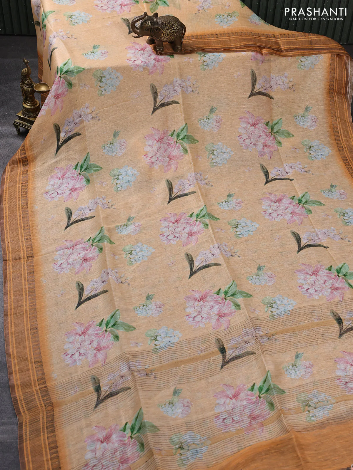 Pure linen silk saree pale orange and orange with allover floral prints and zari woven border - Image 2