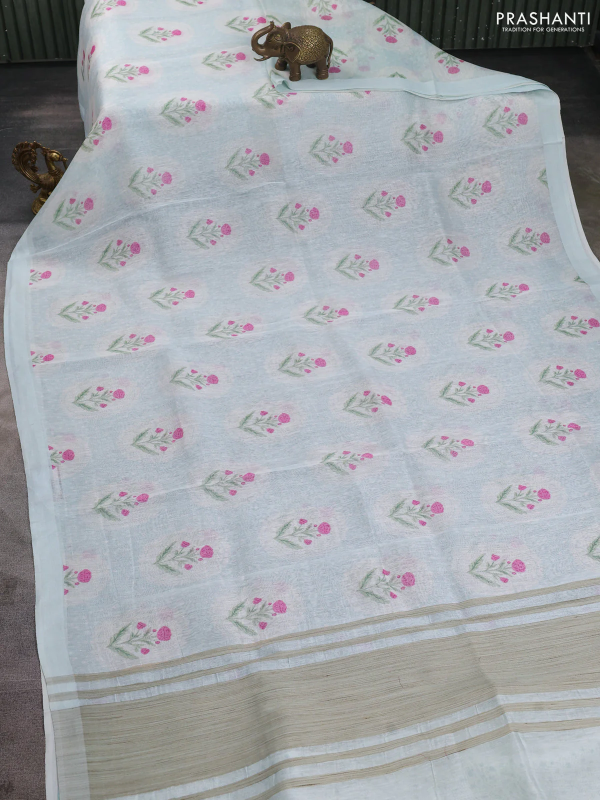Pure linen silk saree pastel blue with allover floral prints and simple border - Image 2