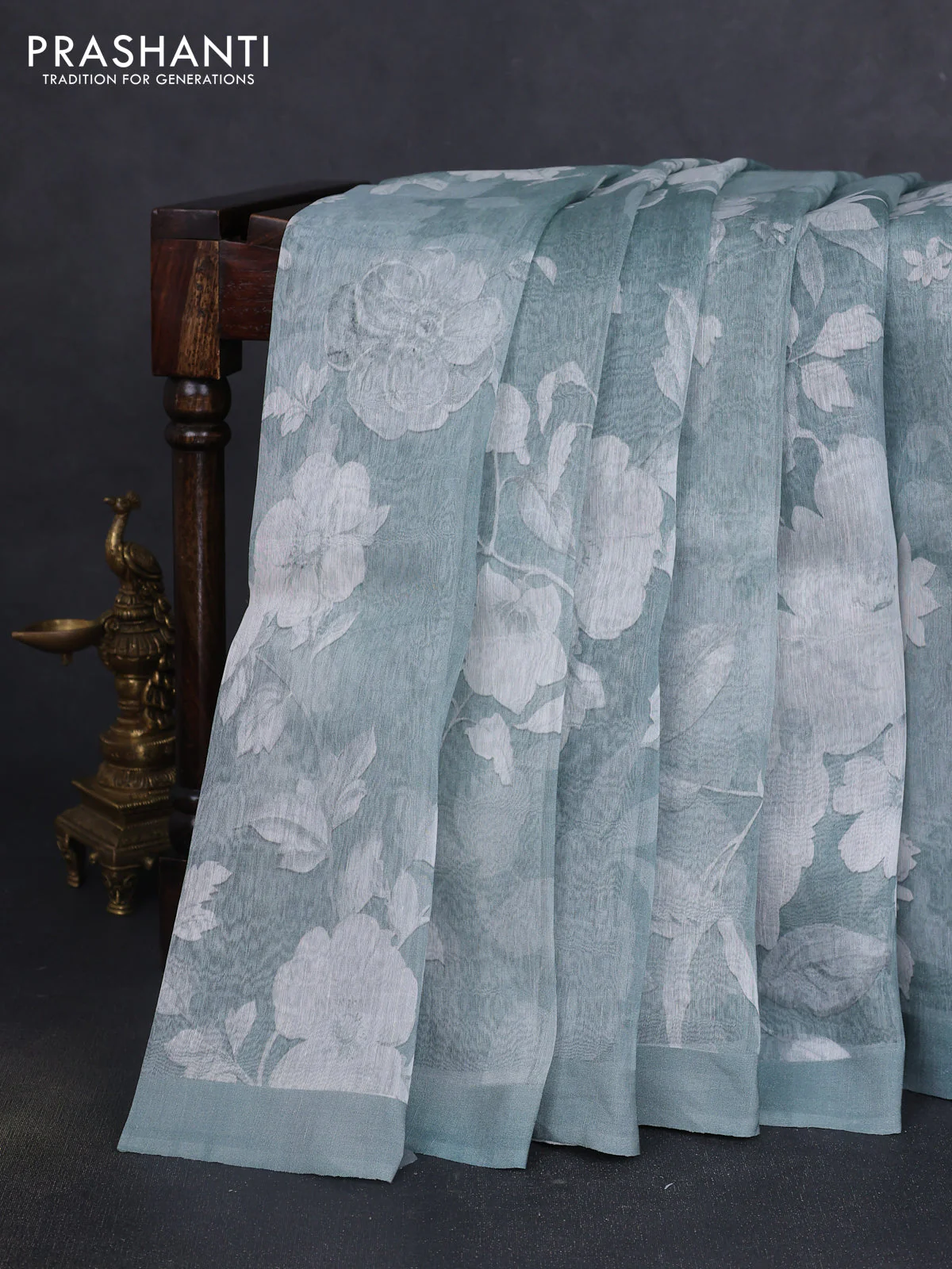 Pure linen silk saree pastel green shade with allover floral prints and simple border