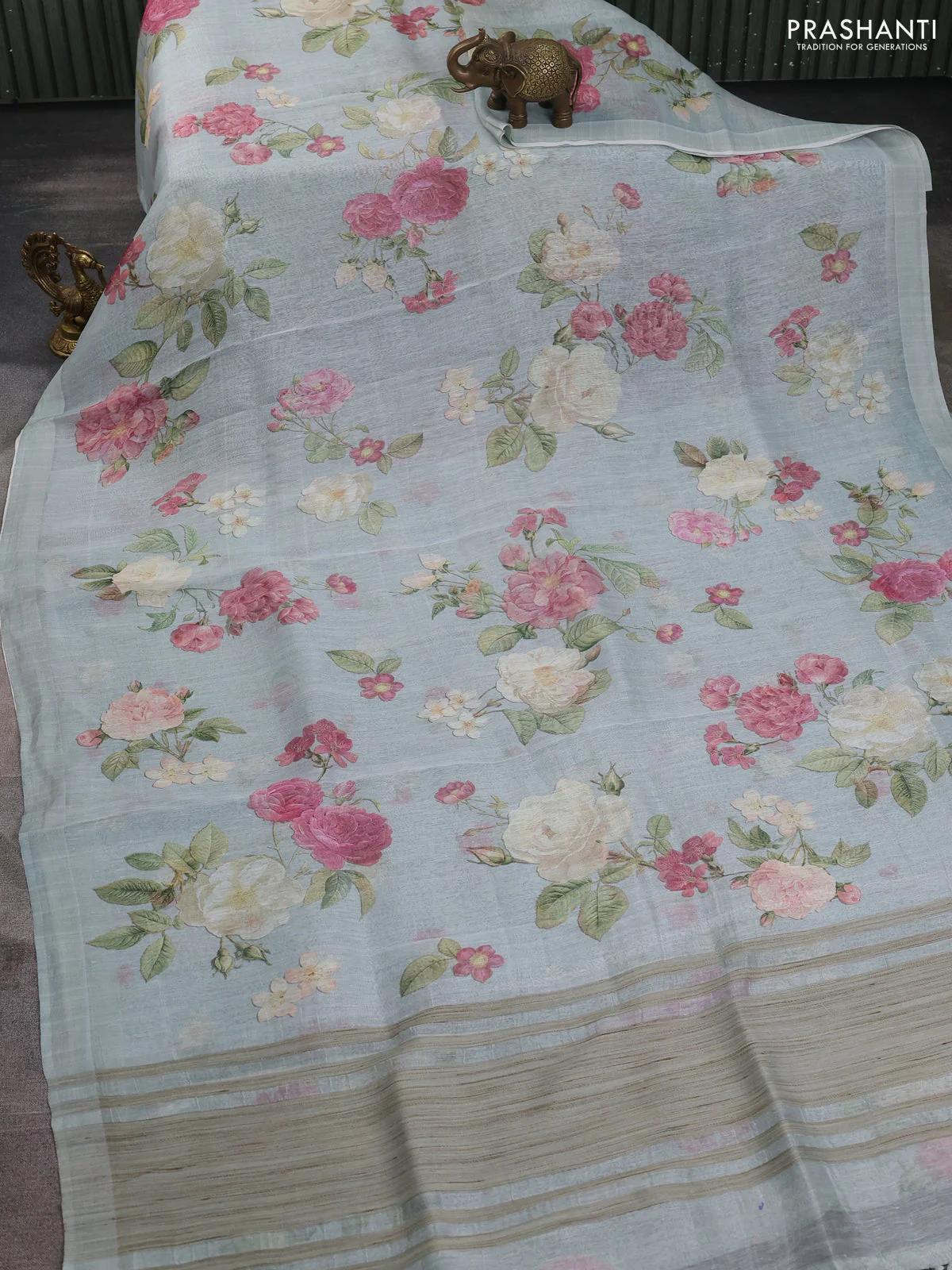Pure linen silk saree pastel green with allover floral prints and simple border - Image 2
