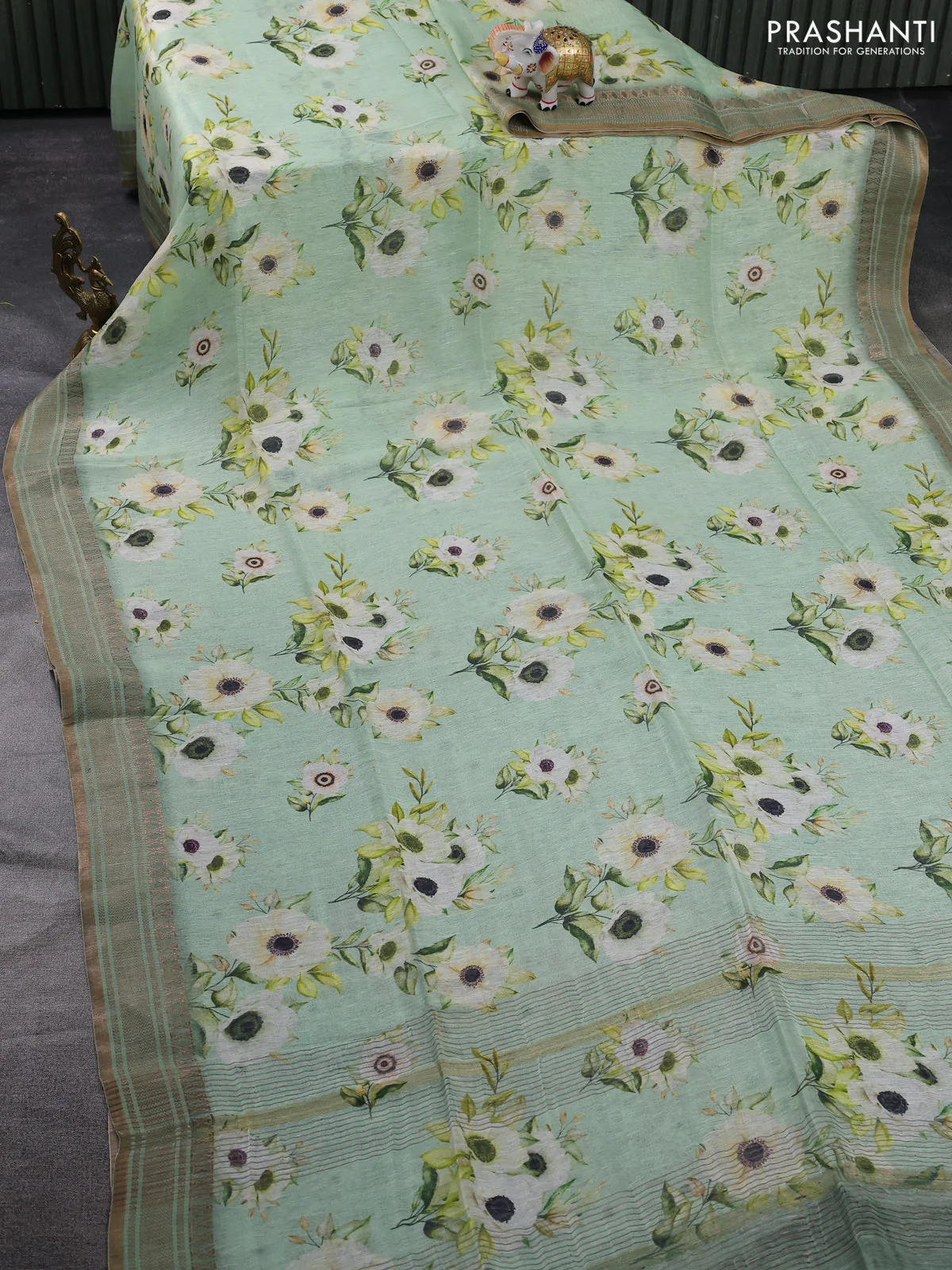 Pure linen silk saree pastel green with allover floral prints and zari woven border - Image 2