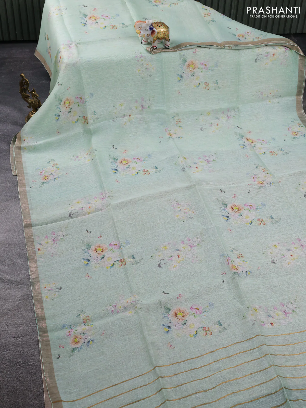Pure linen silk saree teal shade and sandal with floral butta prints and small zari woven border - Image 2