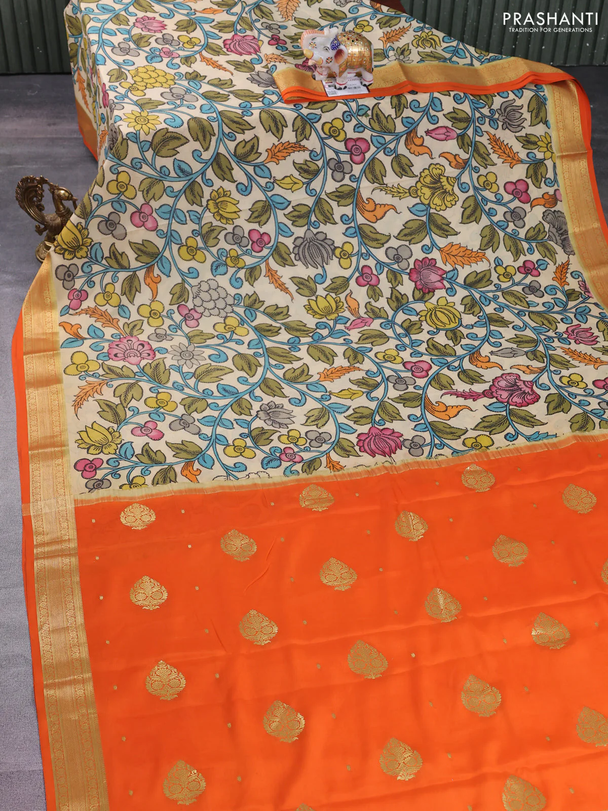 Pure mysore silk saree cream and orange with allover pen kalamkari prints and zari woven border - Image 2