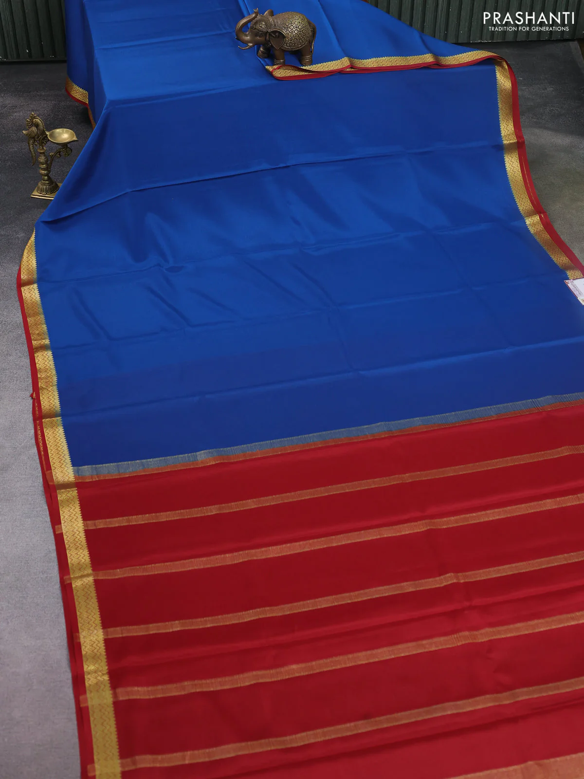 Pure mysore silk saree cs blue and rust shade with plain body and zari woven border - Image 2