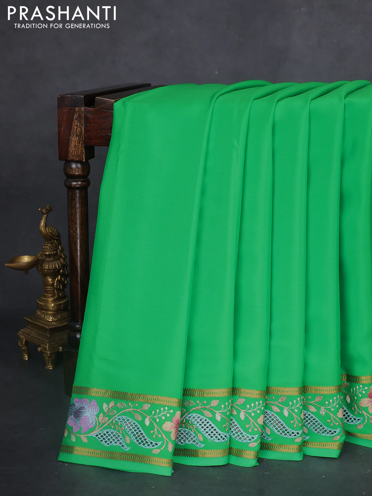 Pure mysore silk saree green with plain body and floral embroidery cut work border