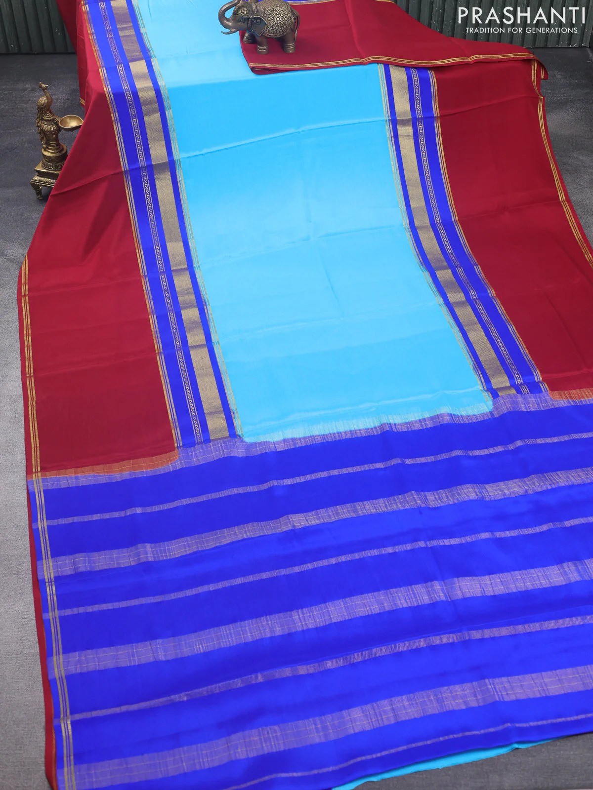 Pure mysore silk saree light blue and blue maroon with plain body and long rettapet zari woven border - Image 2
