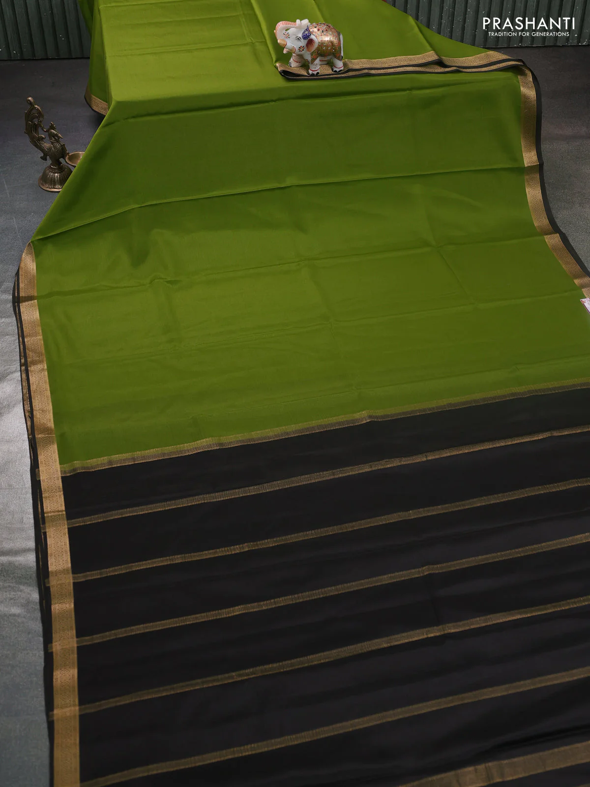Pure mysore silk saree light green and black with plain body and zari woven border - Image 2