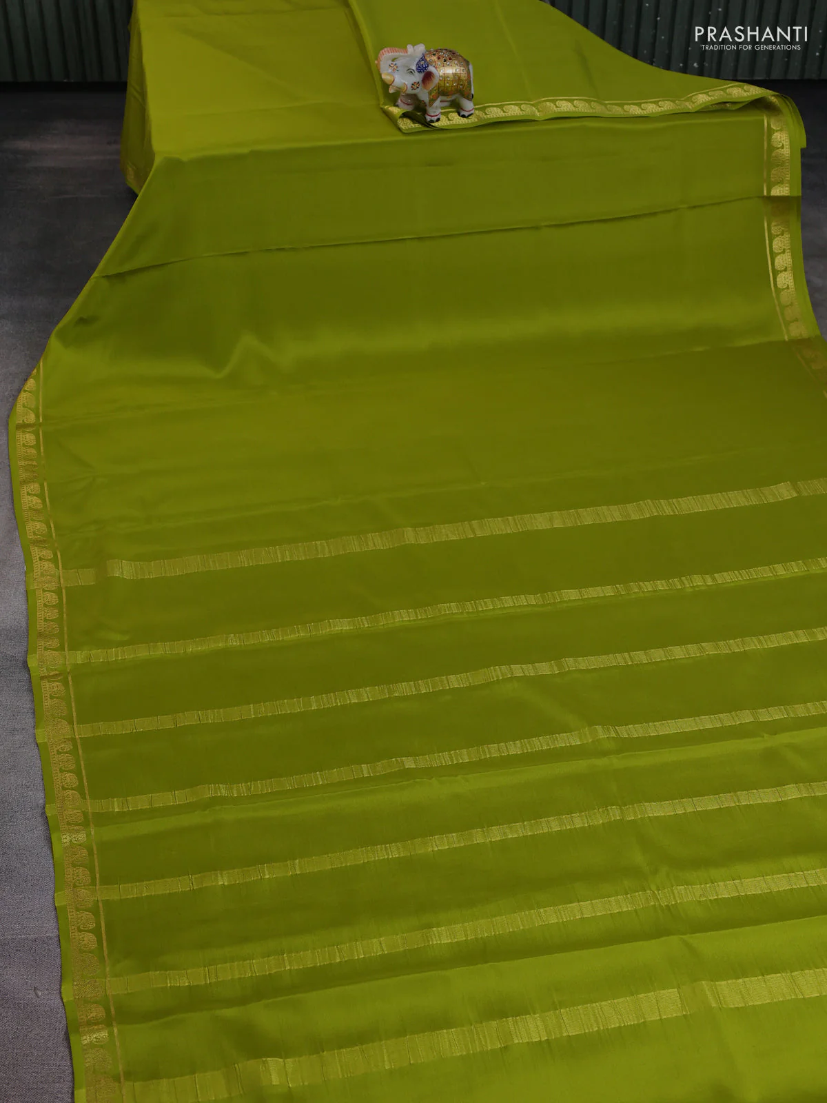 Pure mysore silk saree light green with plain body and elephant zari woven border - Image 2