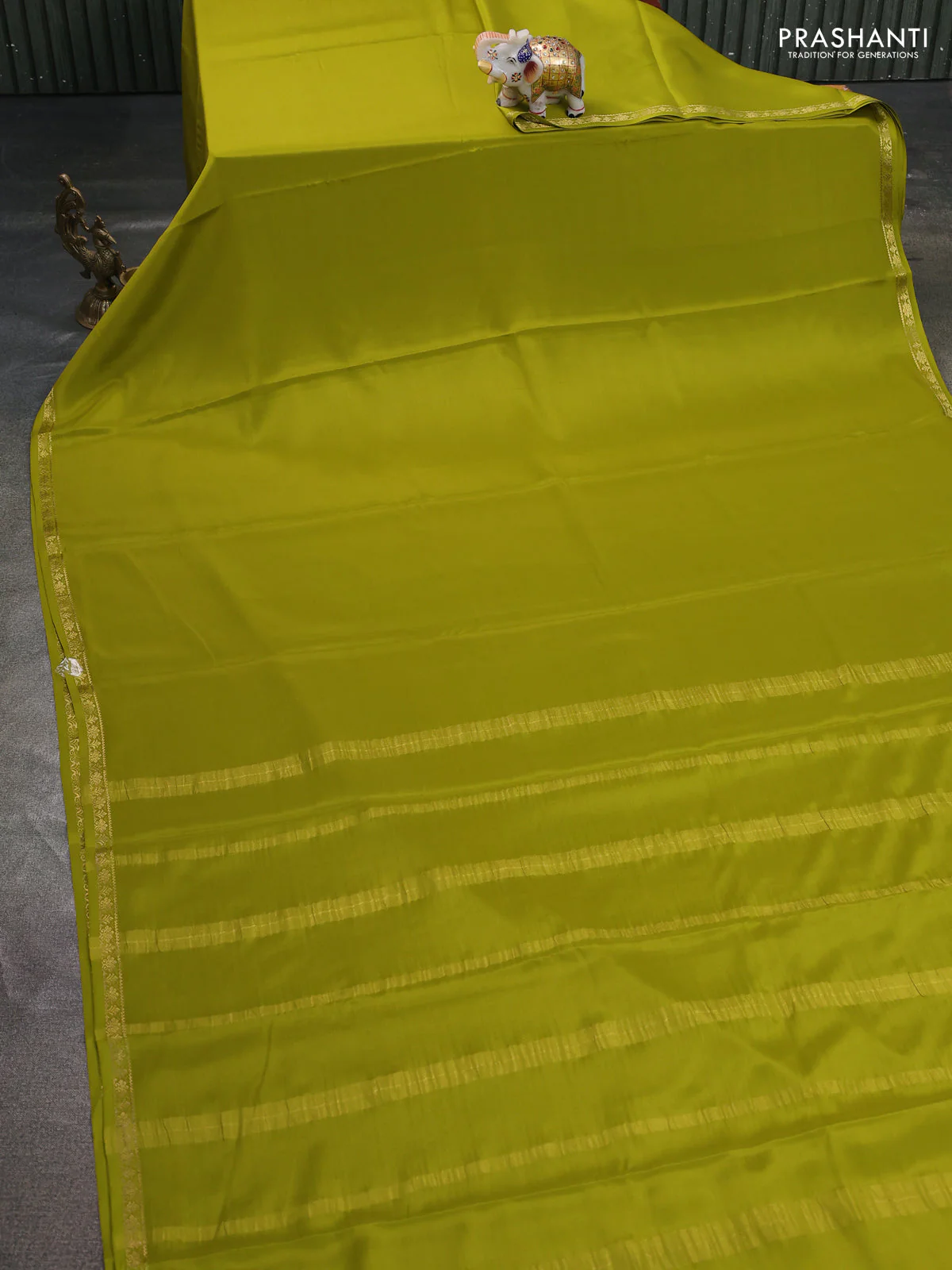 Pure mysore silk saree light green with plain body and small zari woven border - Image 2