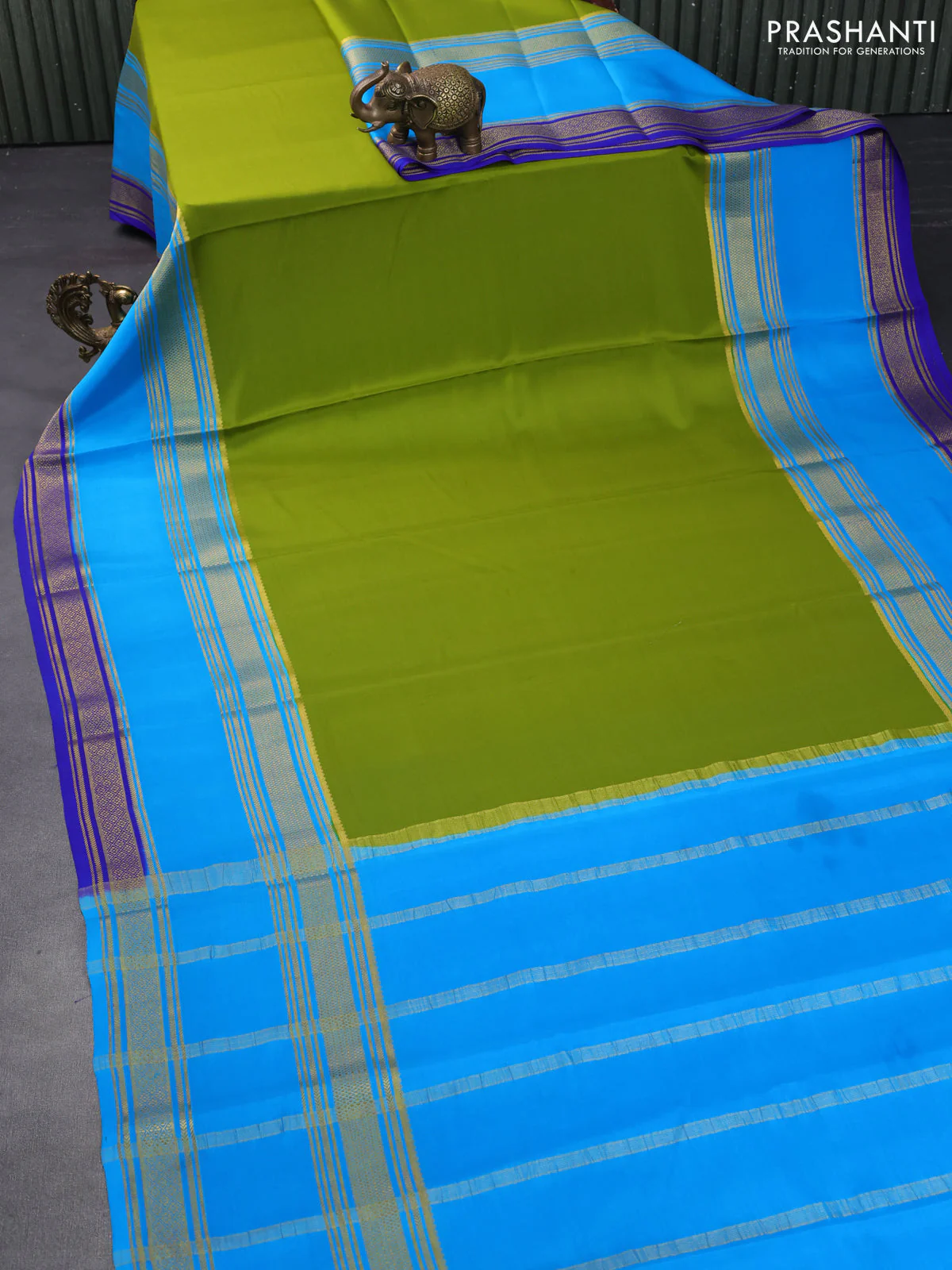 Pure mysore silk saree mehendi green and cs blue with plain body and long rettapet zari woven border - Image 2