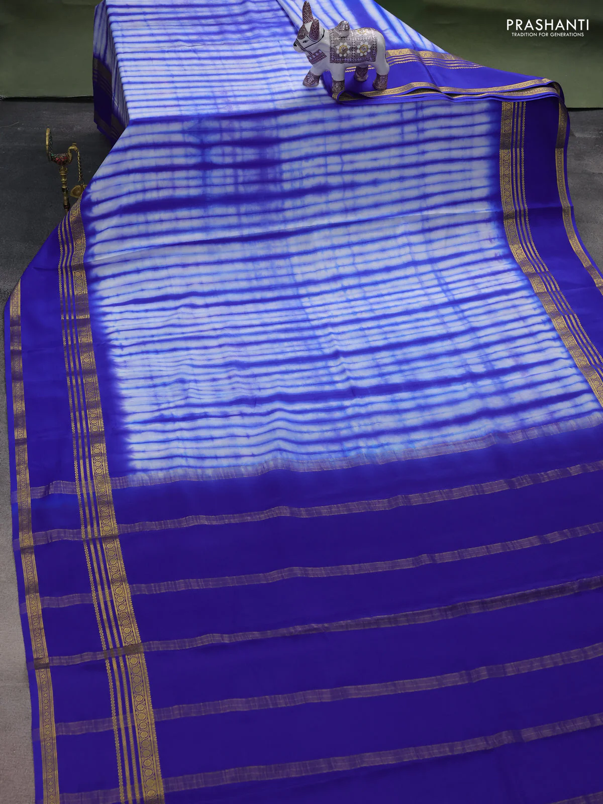 Pure mysore silk saree off white and blue with allover shibori prints and rettapet zari woven border - Image 2