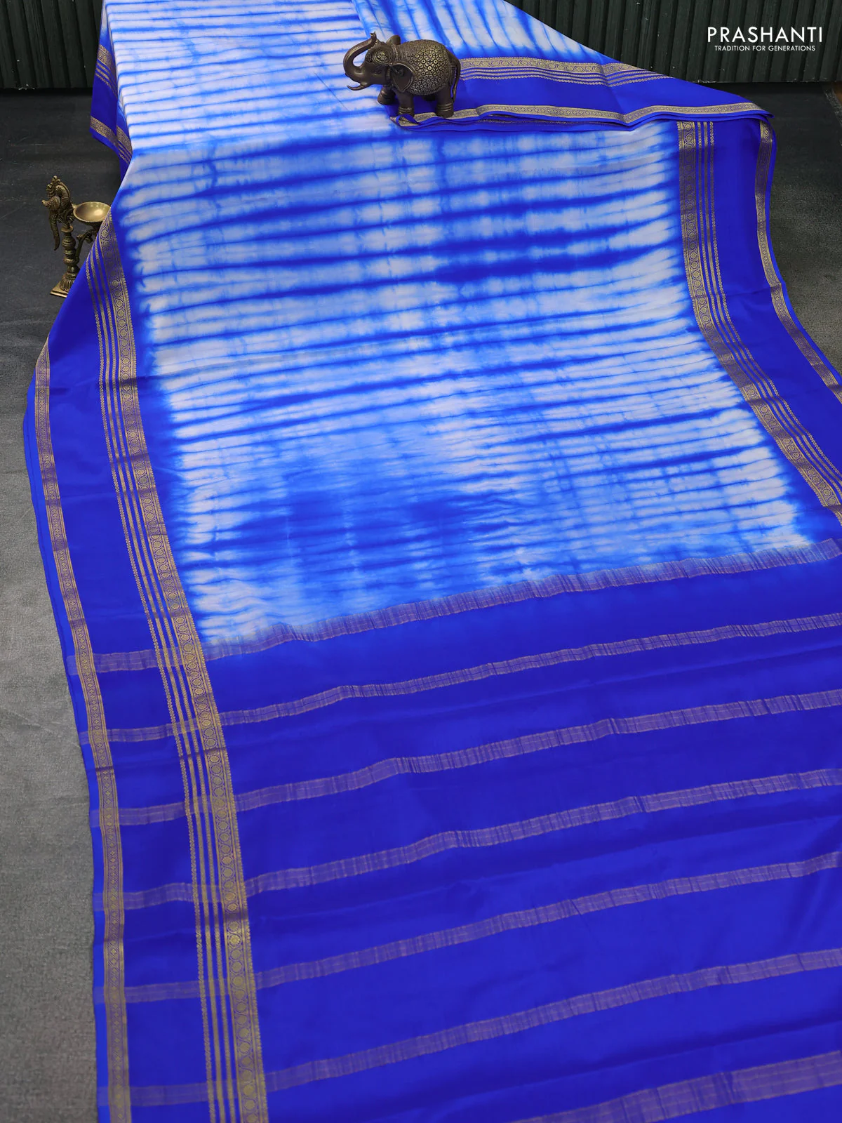 Pure mysore silk saree off white and blue with allover shibori prints and rettapet zari woven border - Image 2