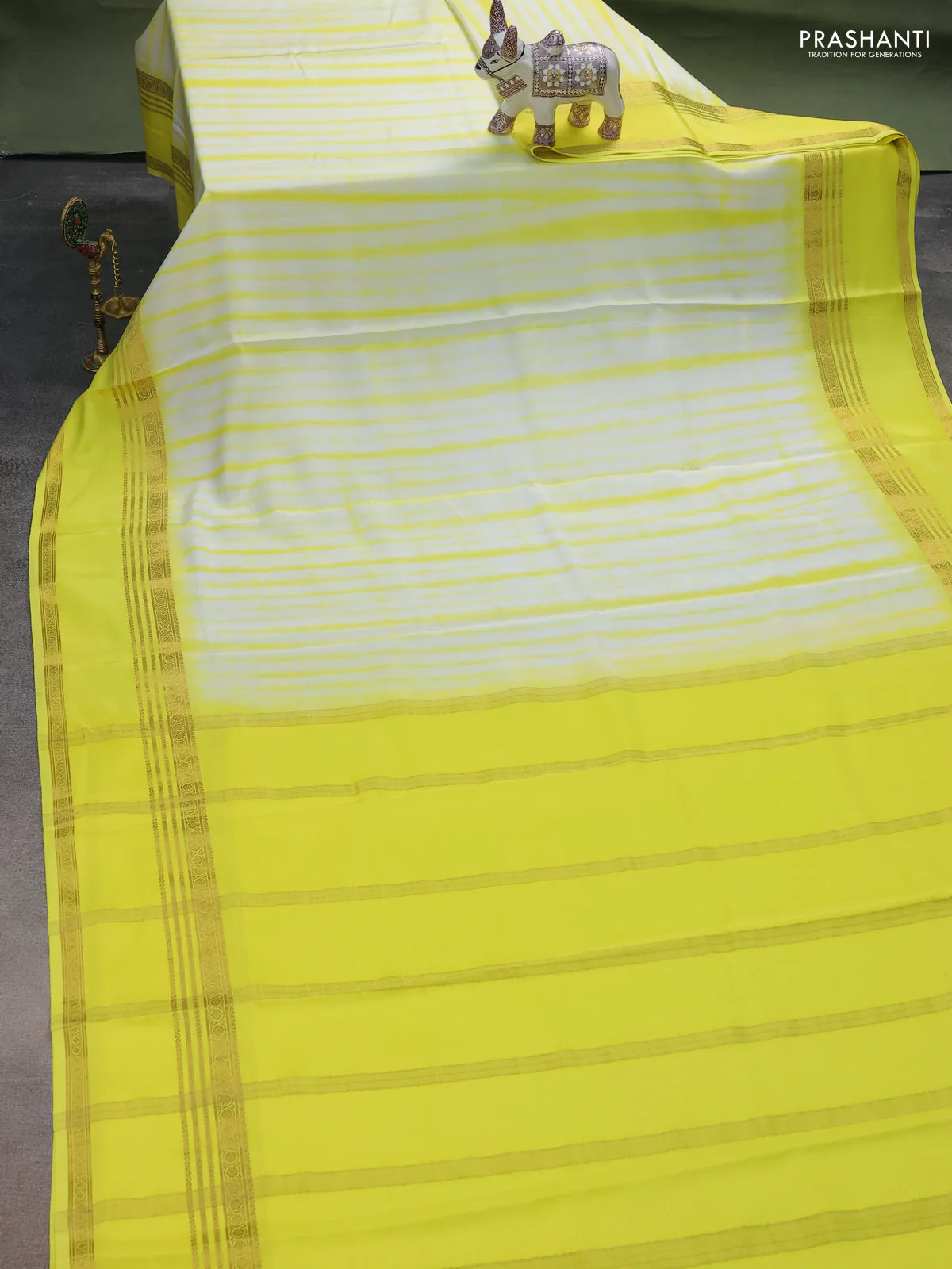 Pure mysore silk saree off white and yellow with allover shibori prints and rettapet zari woven border - Image 2