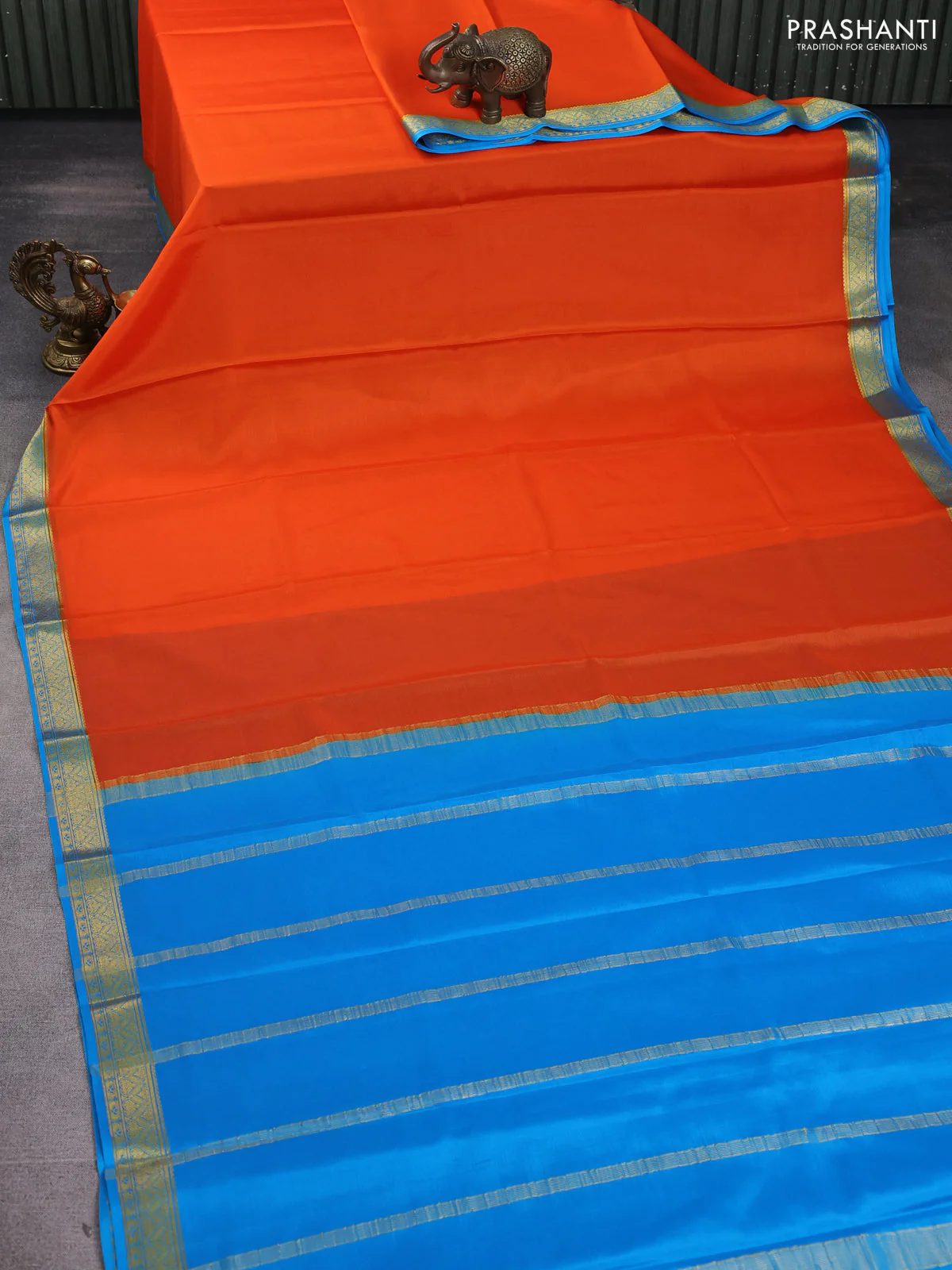 Pure mysore silk saree orange and cs blue with plain body and zari woven border - Image 2