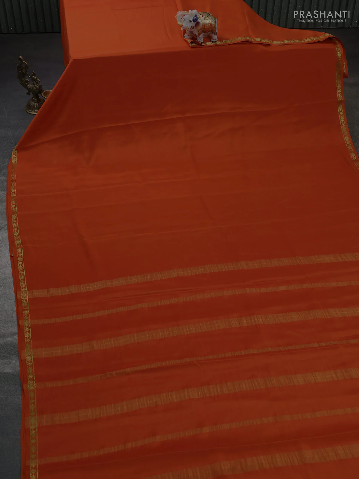 Pure mysore silk saree orange with plain body and small zari woven border - Image 2