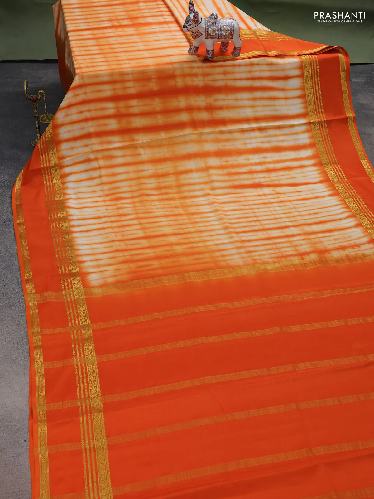 Pure mysore silk saree pale orange and orange with allover shibori prints and rettapet zari woven border - Image 2
