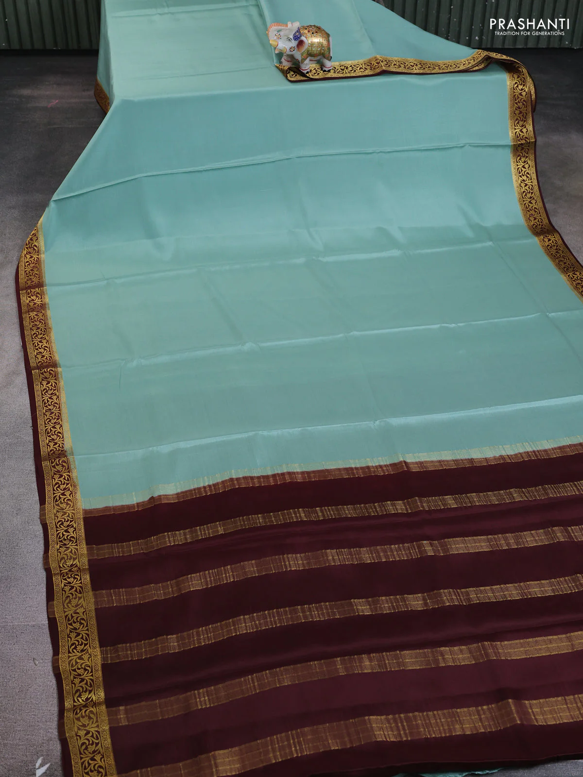 Pure mysore silk saree pastel green and brown with plain body and zari woven border - Image 2