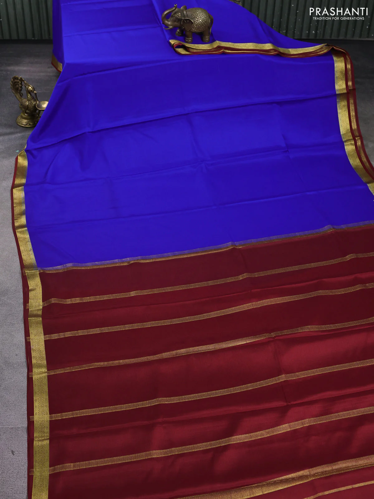 Pure mysore silk saree royal blue and rust shade with plain body and zari woven border - Image 2