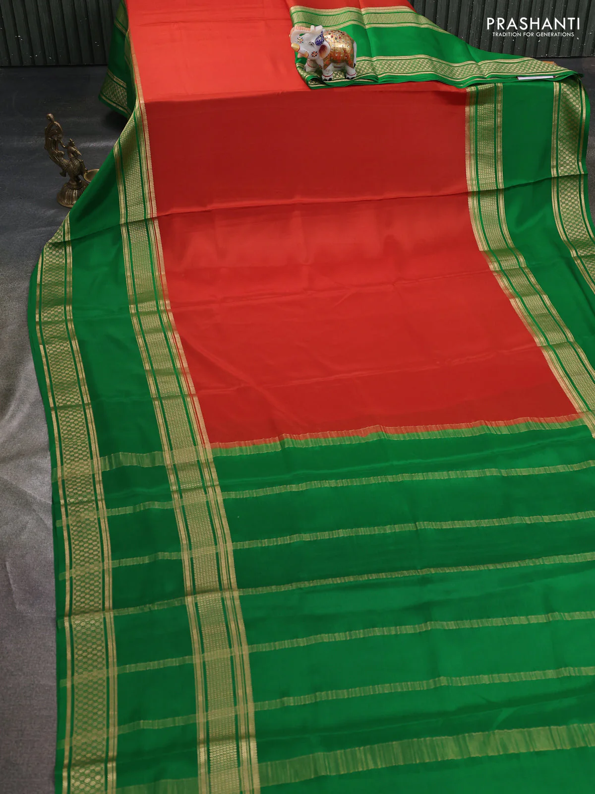 Pure mysore silk saree rust shade and green with plain body and rettapet zari woven border - Image 2