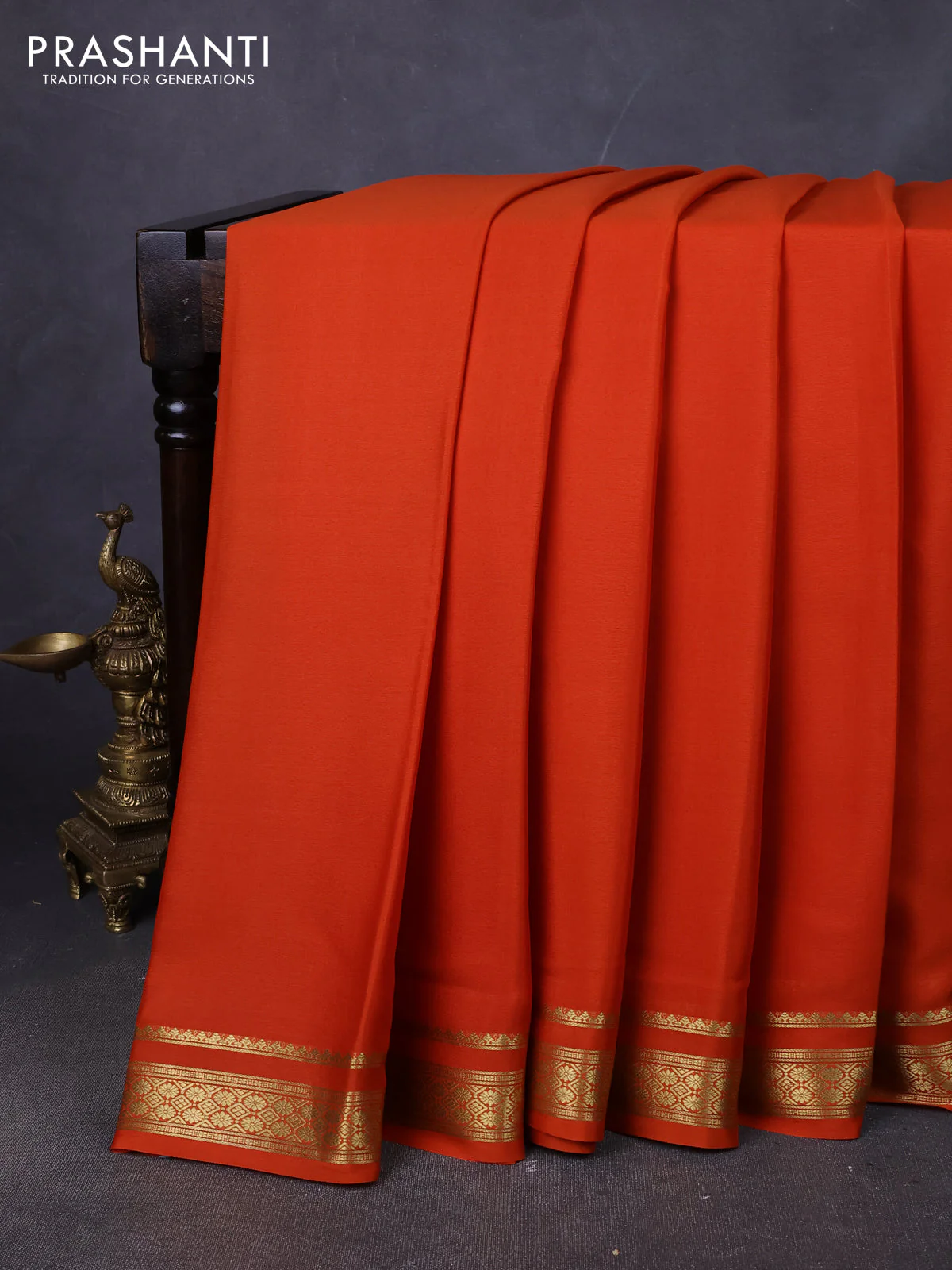 Pure mysore silk saree rust shade with plain body and zari woven border