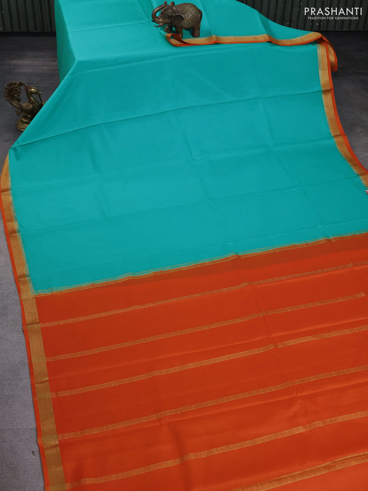 Pure mysore silk saree teal blue and orange with plain body and zari woven border - Image 2